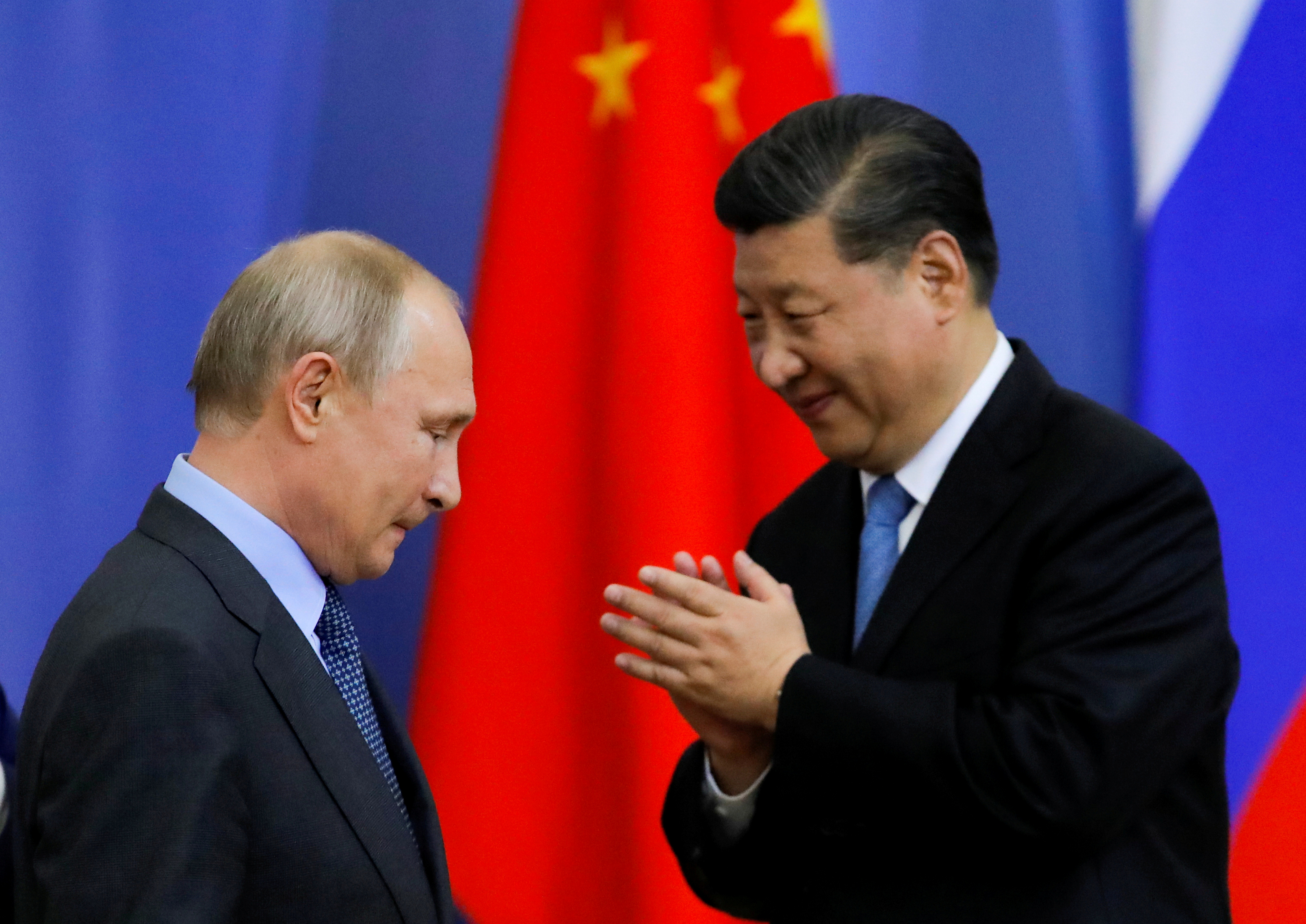 Foto de archivo de Vladimir Putin y Xi Jinping (Reuters)