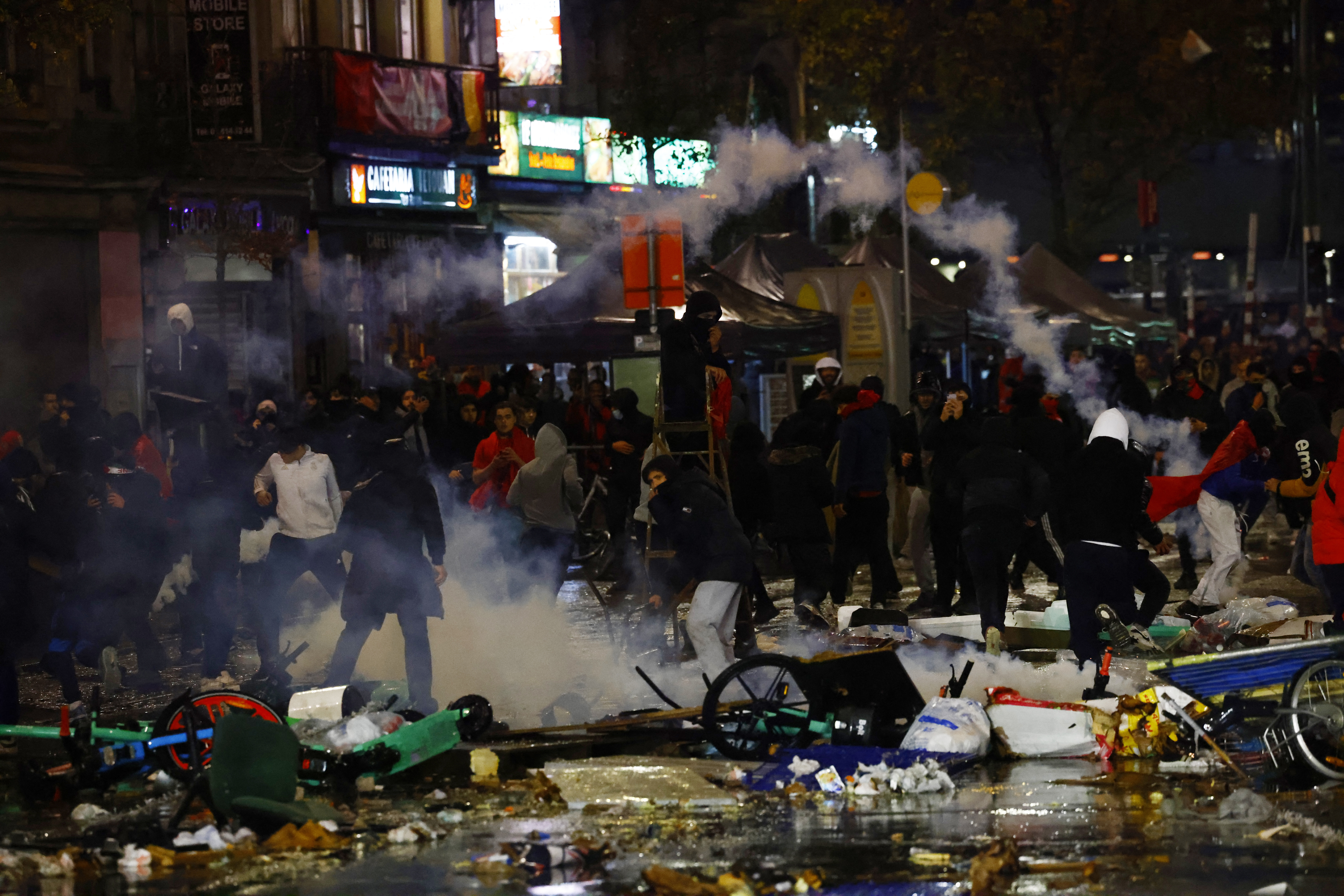 Moroccan supporters clash with police on the streets of Brussels (REUTERS/Yves Herman)