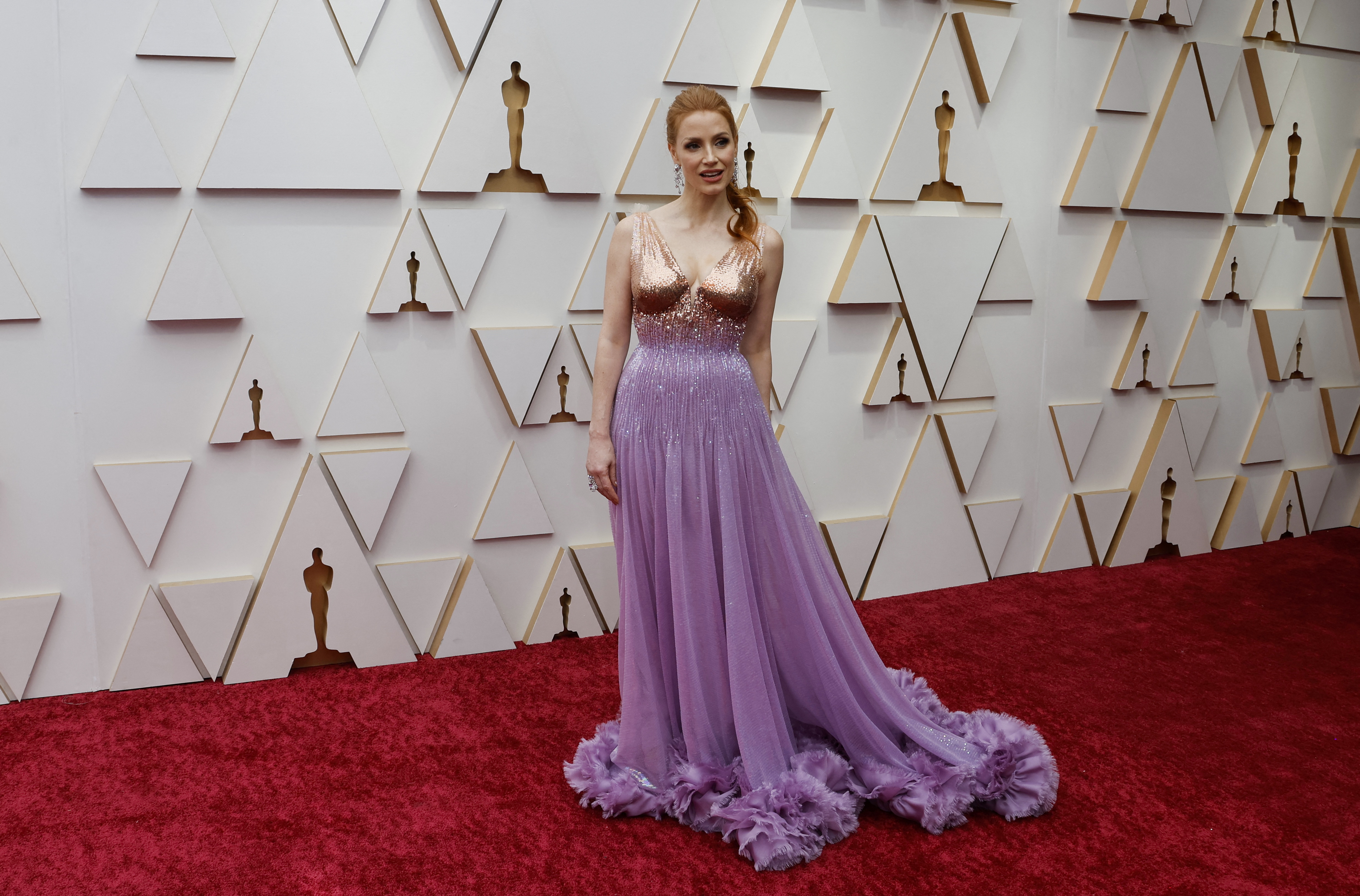 Best Actress nominee Jessica Chastain poses on the red carpet during the Oscars arrivals at the 94th Academy Awards in Hollywood, Los Angeles, California, U.S., March 27, 2022. REUTERS/Eric Gaillard