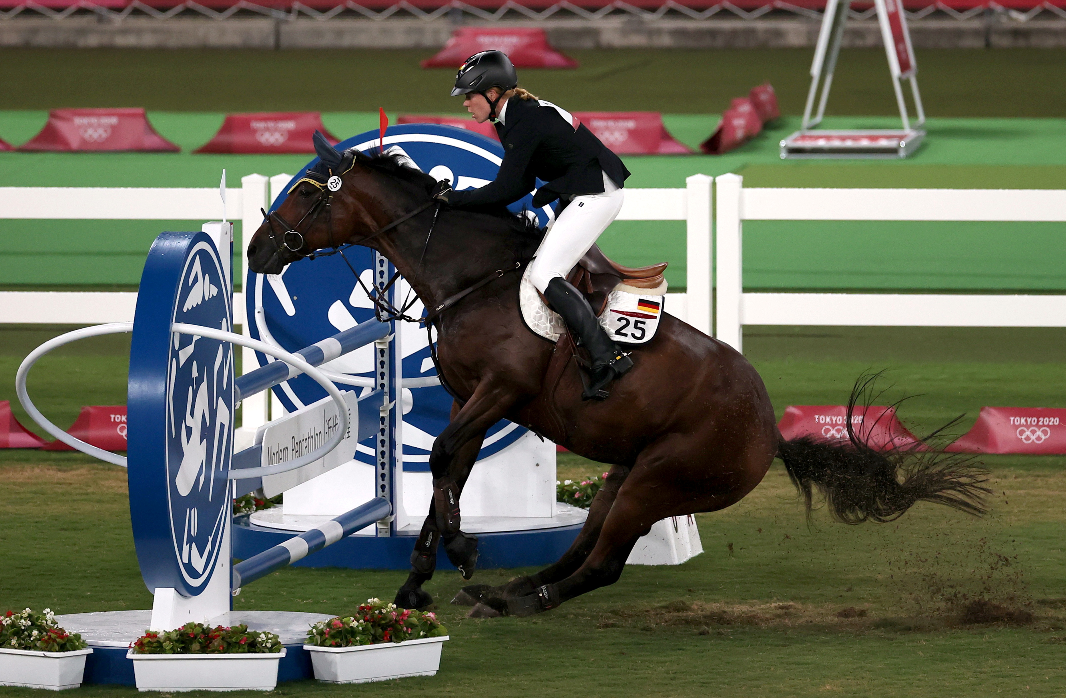 Tokyo 2020 Olympics - Modern Pentathlon - Women's Riding - Tokyo Stadium - Tokyo, Japan - August 6, 2021. Annika Schleu of Germany in action REUTERS/Ivan Alvarado/File photo       SEARCH "BEST OF THE TOKYO OLYMPICS" FOR ALL PICTURES. TPX IMAGES OF THE DAY.