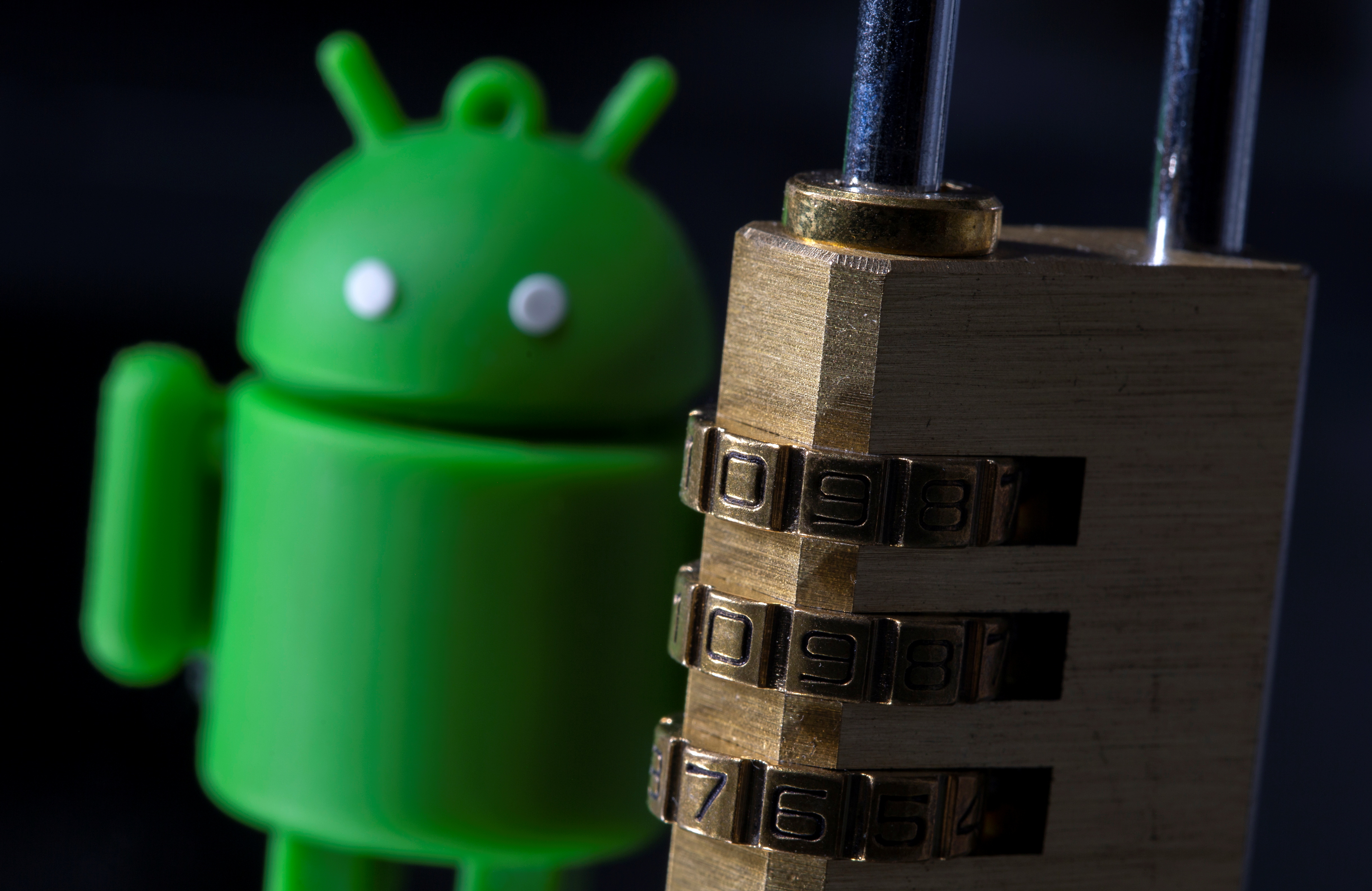 A 3D printed Android logo is seen in front of a padlock in this illustration picture taken May 4, 2021. REUTERS/Dado Ruvic/Illustration