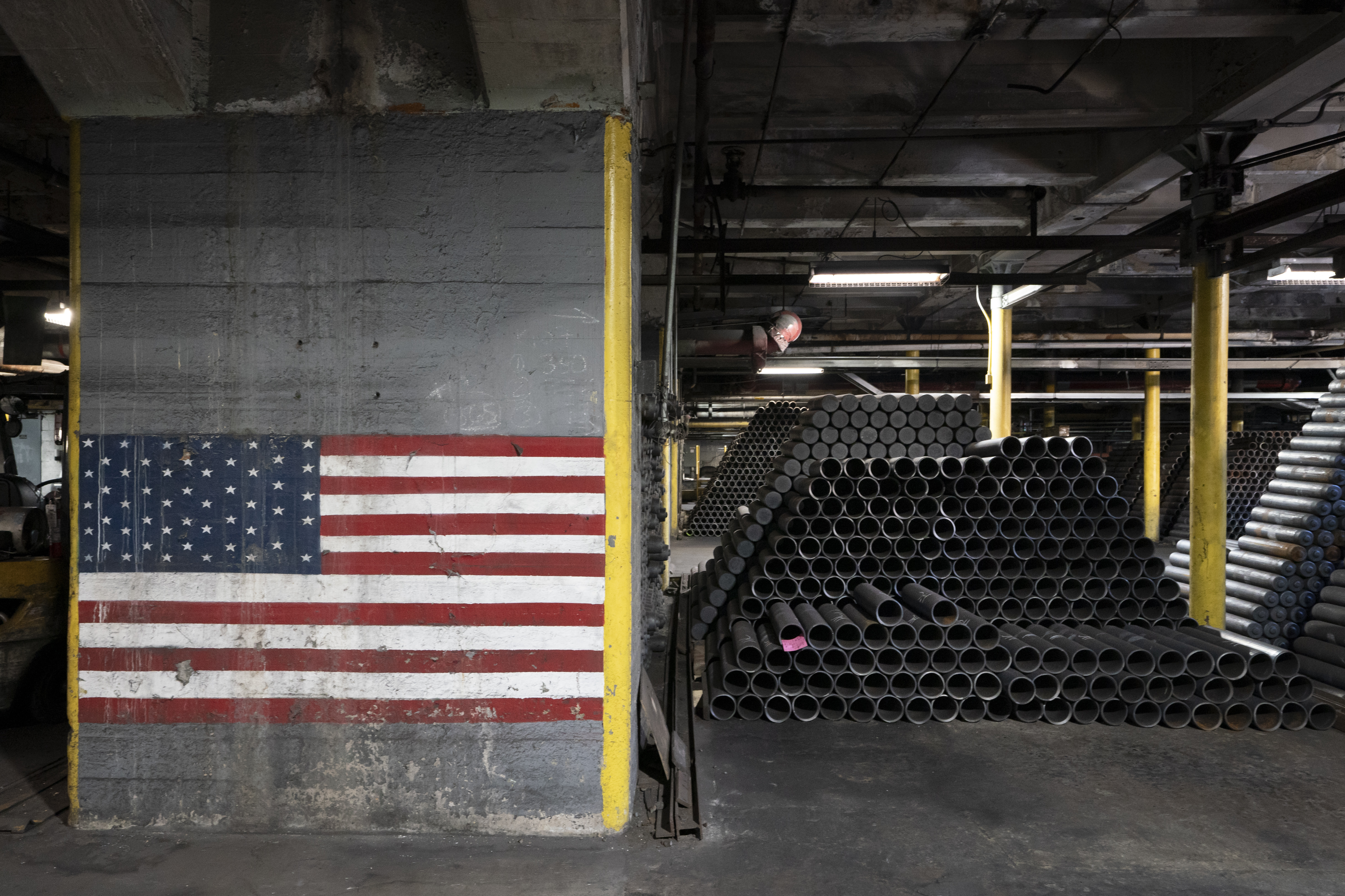 M795 155mm artillery shells are stacked during the manufacturing process at the Scranton Army Ammunition Plant in Scranton, Pa., Thursday, April 13, 2023. (AP Photo/Matt Rourke)

