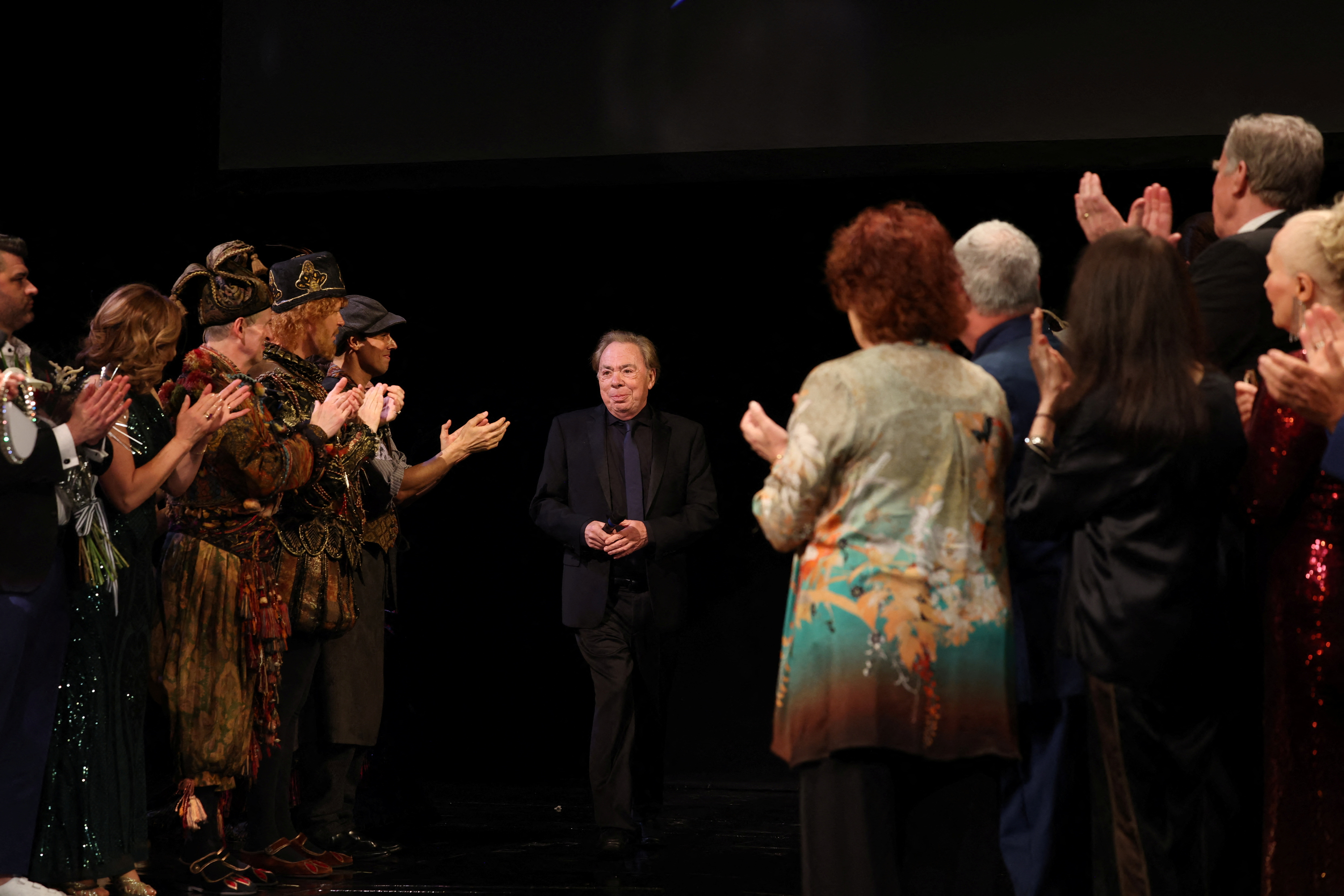 The play's music producer, Andrew Lloyd Webber, waved goodbye from the stage after the performance.  (PHOTO: REUTERS/Caitlin Ochs)