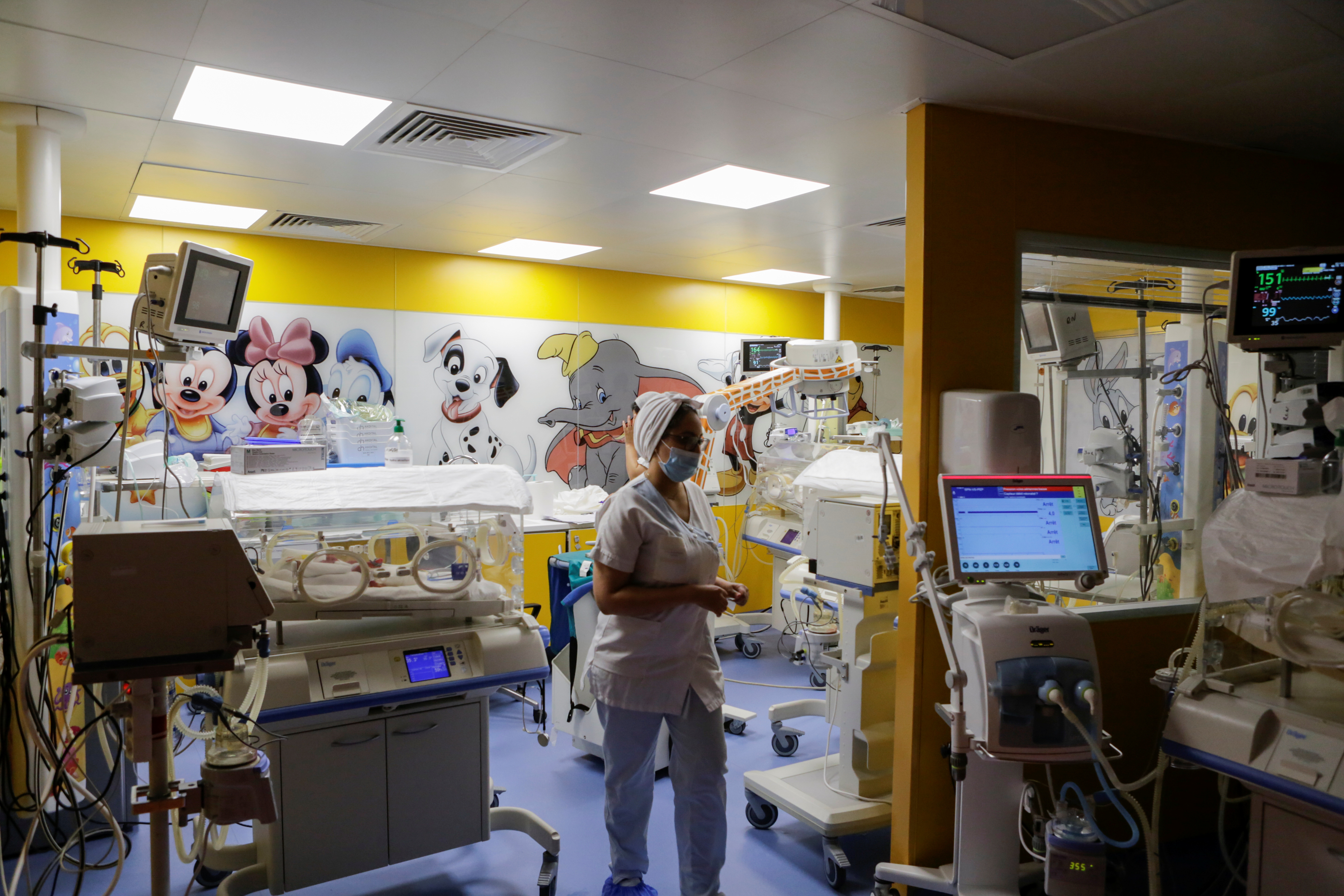 A nurse walks inside a maternity ward where the newborn nonuplets are, at the private clinic of Ain Borja in Casablanca, Morocco May 5, 2021. REUTERS/Youssef Boudlal