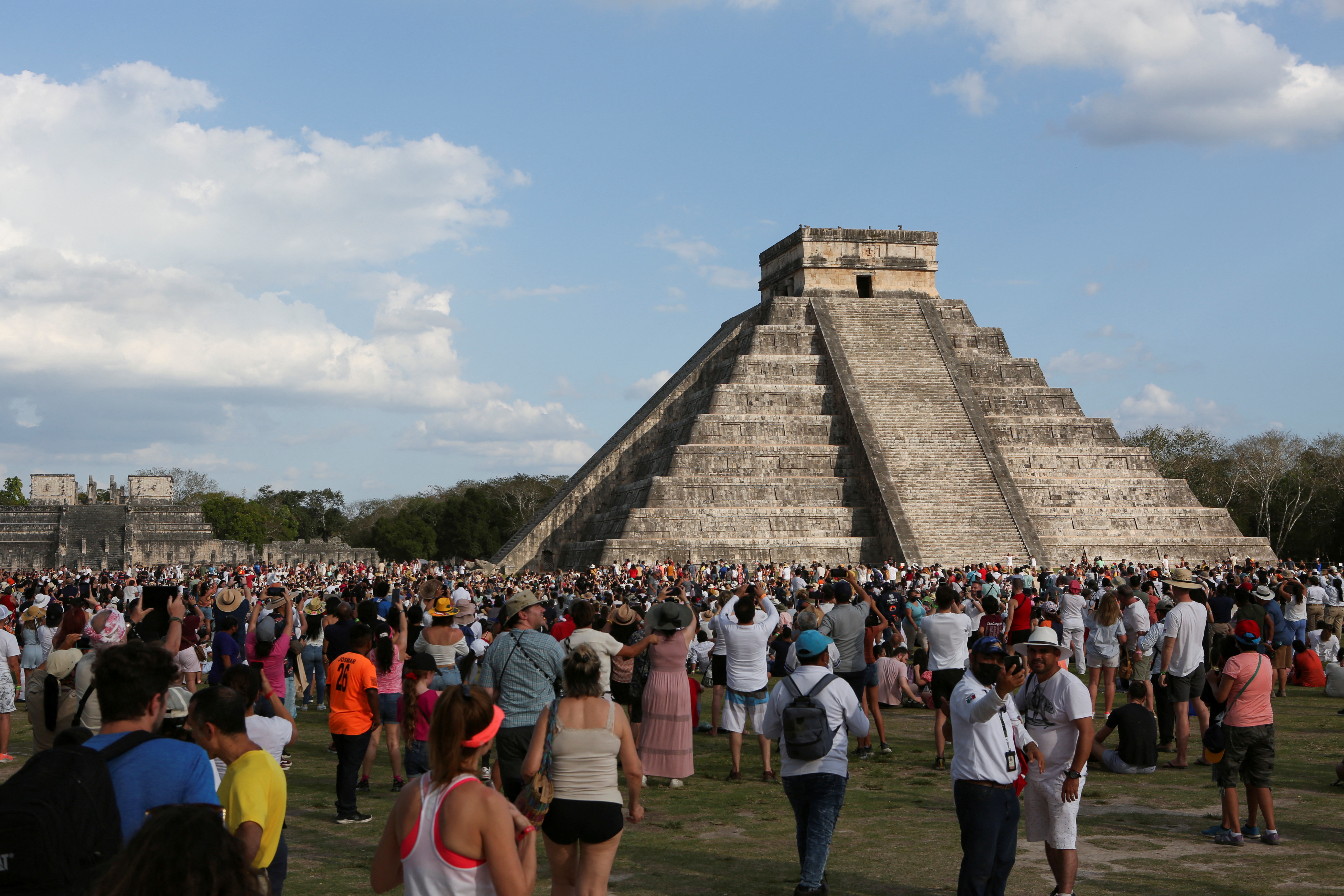 People gather at the archaeological zone of Chichen Itza to celebrate the Spring Equinox, in Yucatan state, Mexico March 21, 2022. Picture taken March 21, 2022. REUTERS/Lorenzo Hernandez