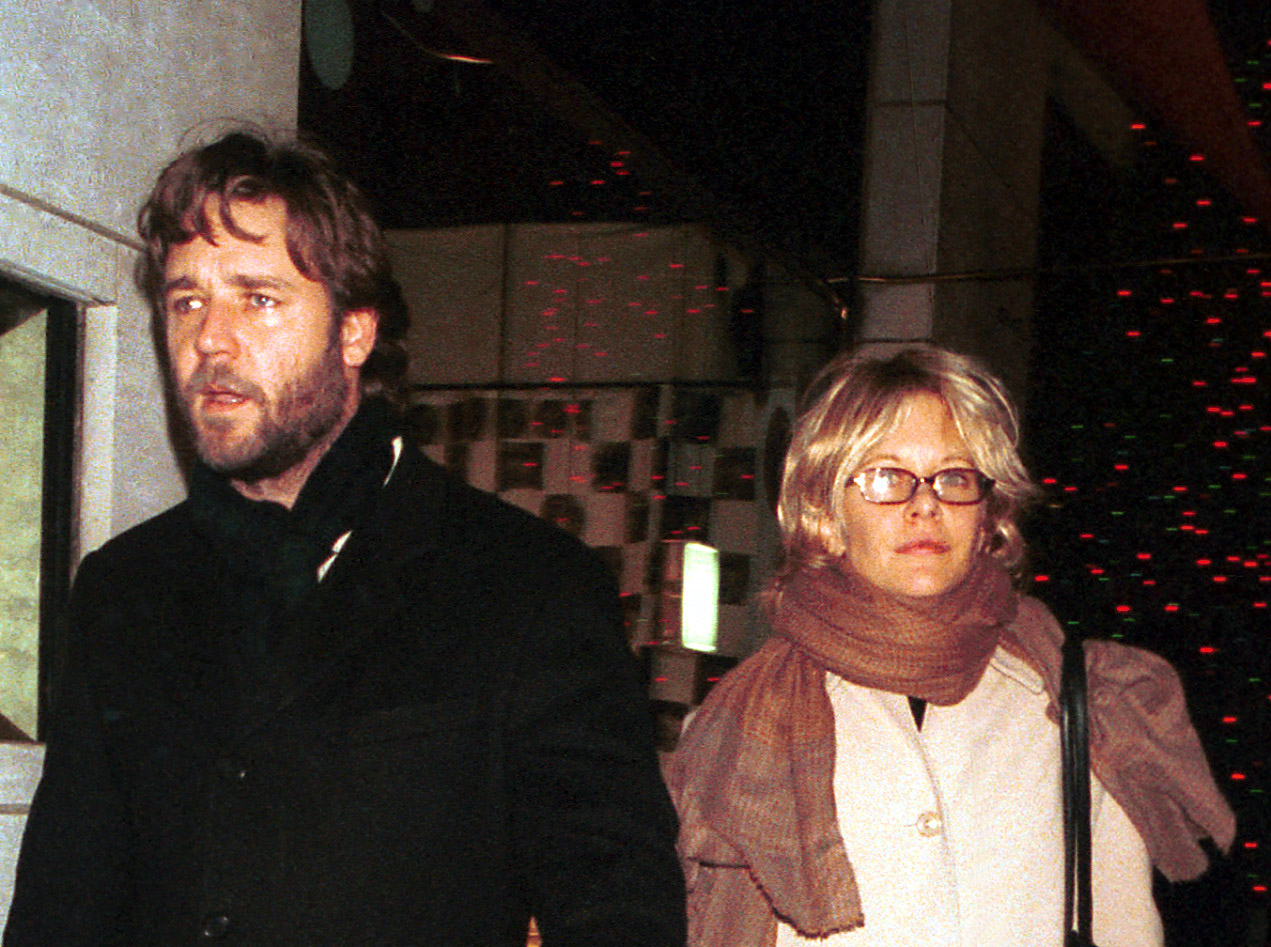 Actors Russell Crowe and Meg Ryan surprised on Madison Avenue in New York in November 2000 (Photo by Arnaldo Magnani/Liaison)