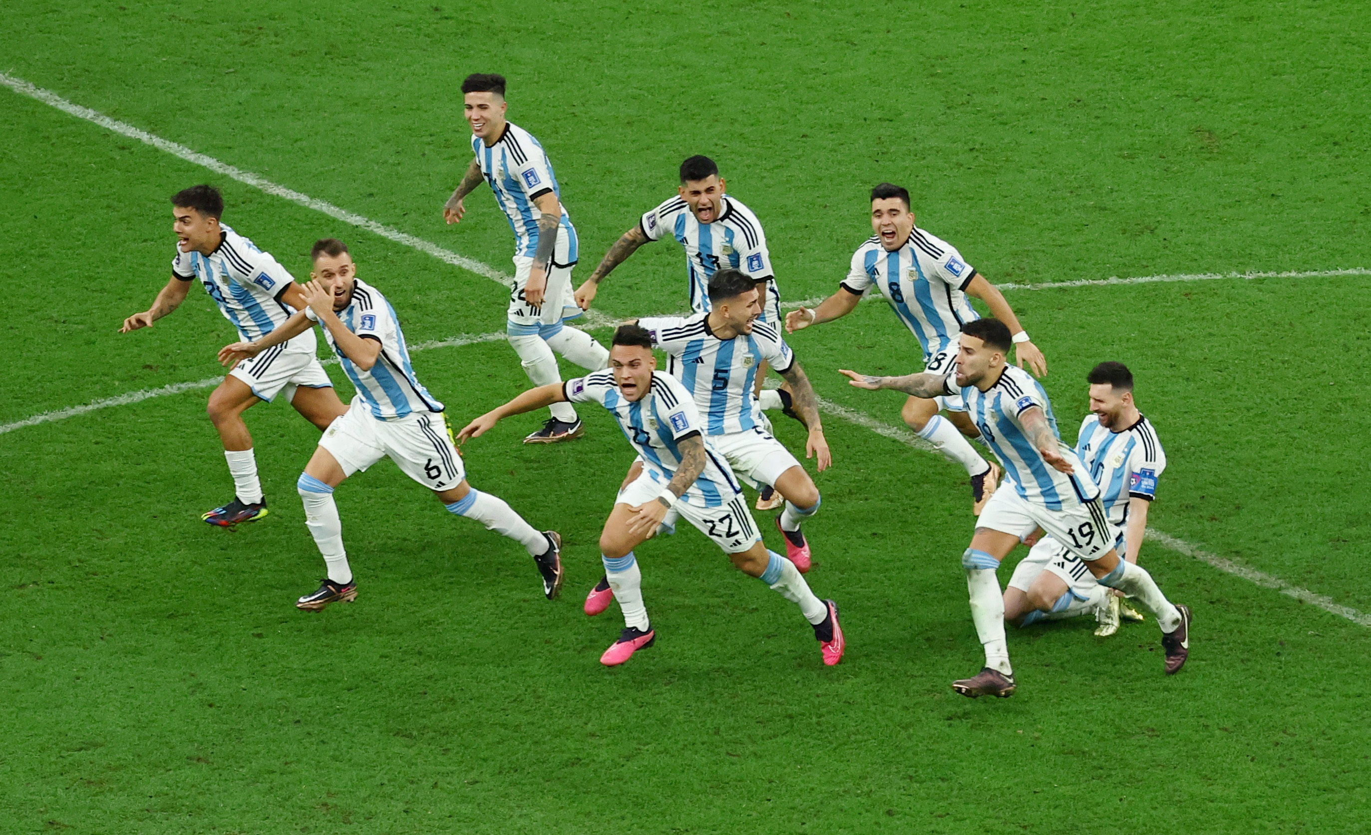 Soccer Football - FIFA World Cup Qatar 2022 - Final - Argentina v France - Lusail Stadium, Lusail, Qatar - December 18, 2022 Argentina players celebrate winning the World Cup after the penalty shootout REUTERS/Molly Darlington