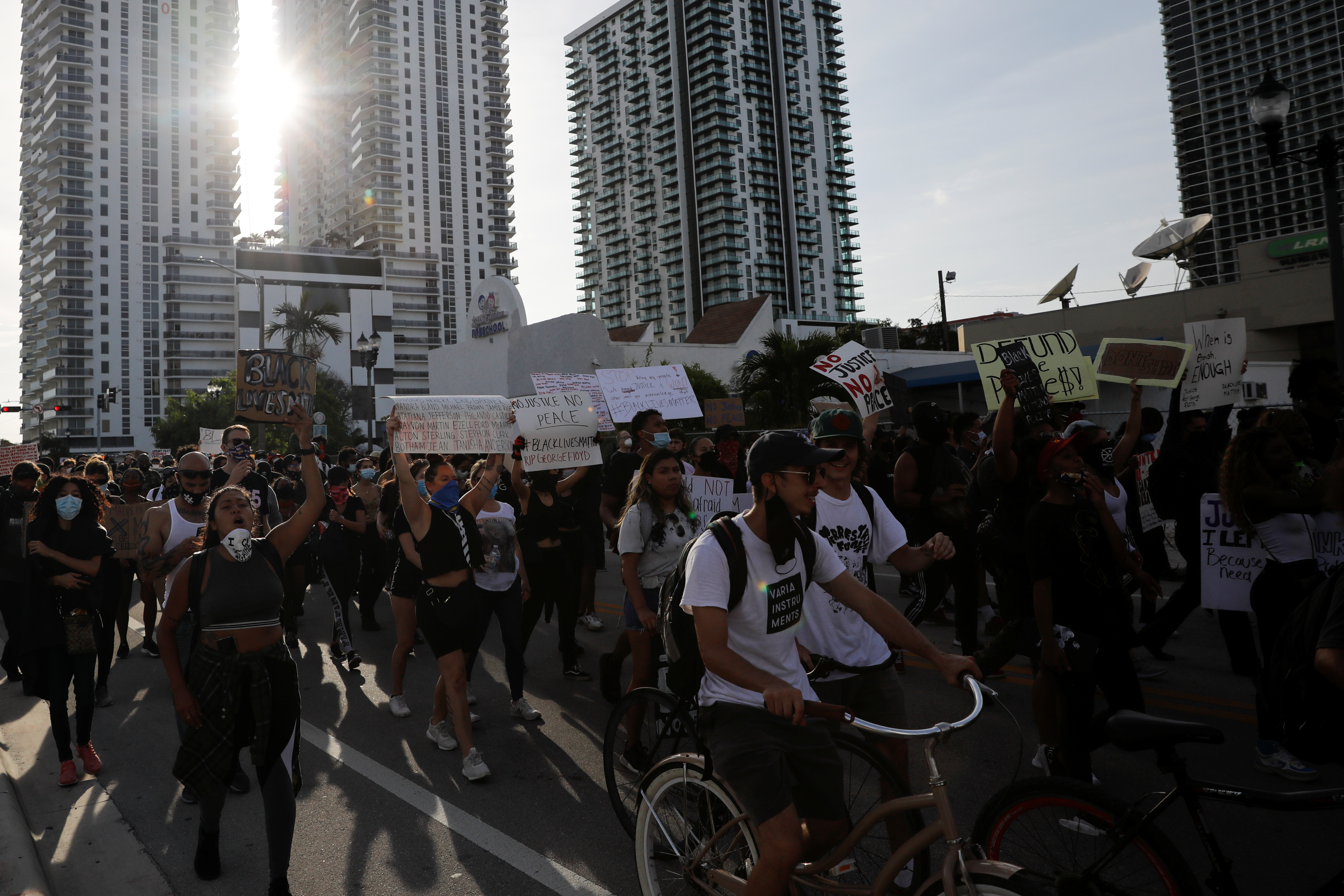 People attend a protest amid nationwide unrest following the death in Minneapolis police custody of George Floyd, in Miami, Florida, U.S., May 31, 2020. REUTERS/Marco Bello