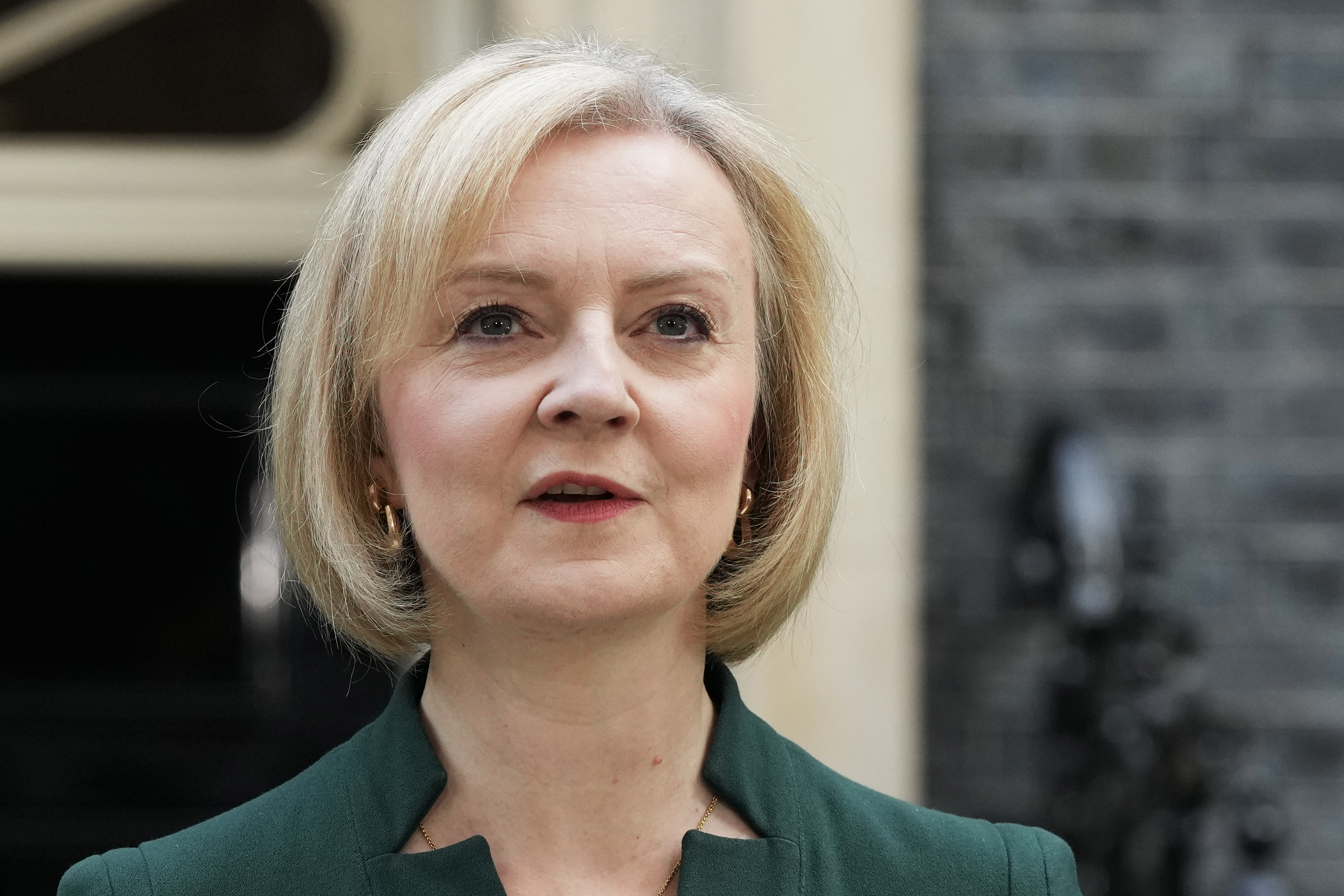 FILE - Outgoing British Prime Minister Liz Truss speaks outside 10 Downing Street in London on Oct. 25, 2022. (AP Photo/Frank Augstein, File)