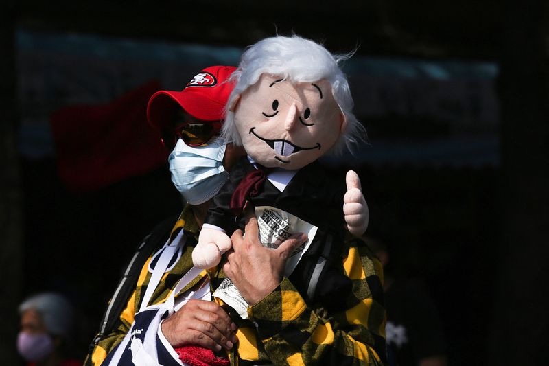Stock image.  A protester holds a doll representing Mexican President Andrés Manuel López Obrador during a march to Congress in support of the president's proposed electricity reform, in Mexico City, Mexico.  April 12, 2022. REUTERS/Quetzalli Nicte/NO RESALE OR ARCHIVES