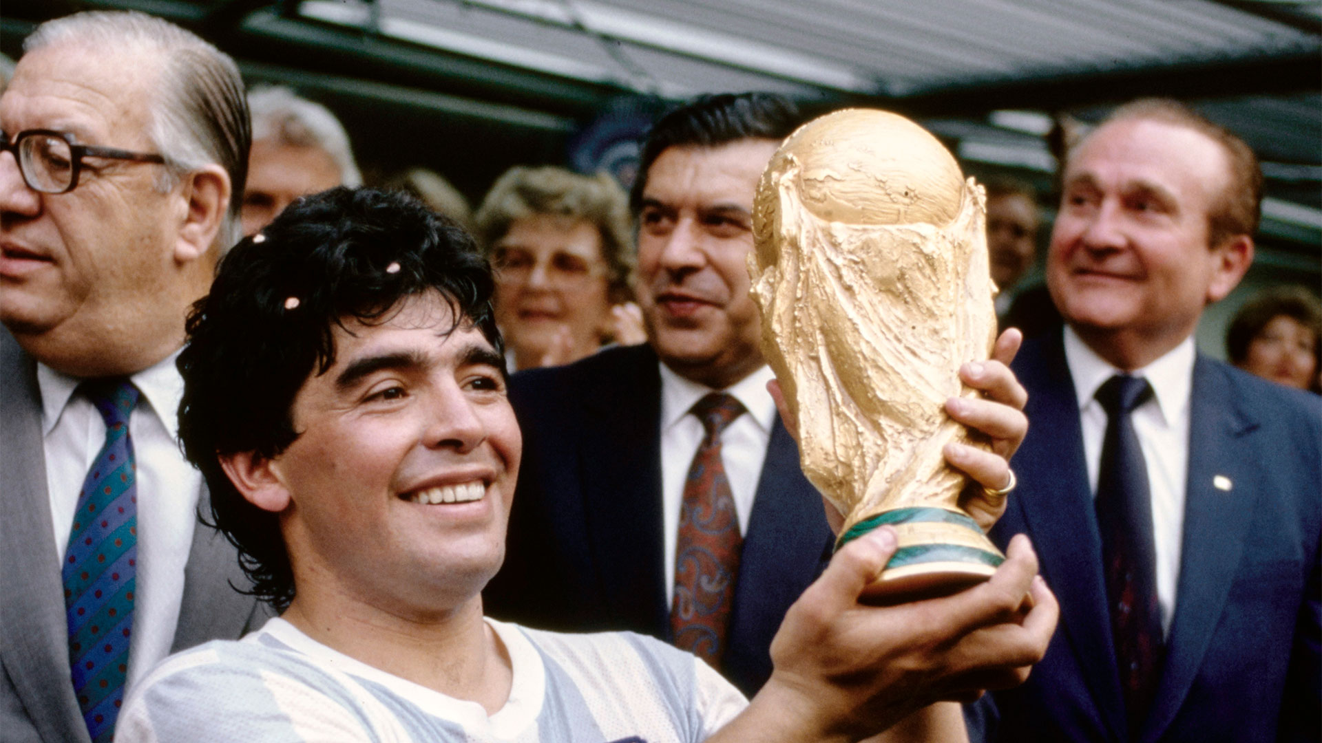 MEXICO CITY, MEXICO - JUNE 29: Argentina captain Diego Maradona holds aloft the trophy after the FIFA 1986 World Cup  final match against West Germany at the Azteca Stadium on June 29th, 1986 in Mexico City, Mexico. (Photo by Mike King/Allsport/Getty Images/Hulton Archive)