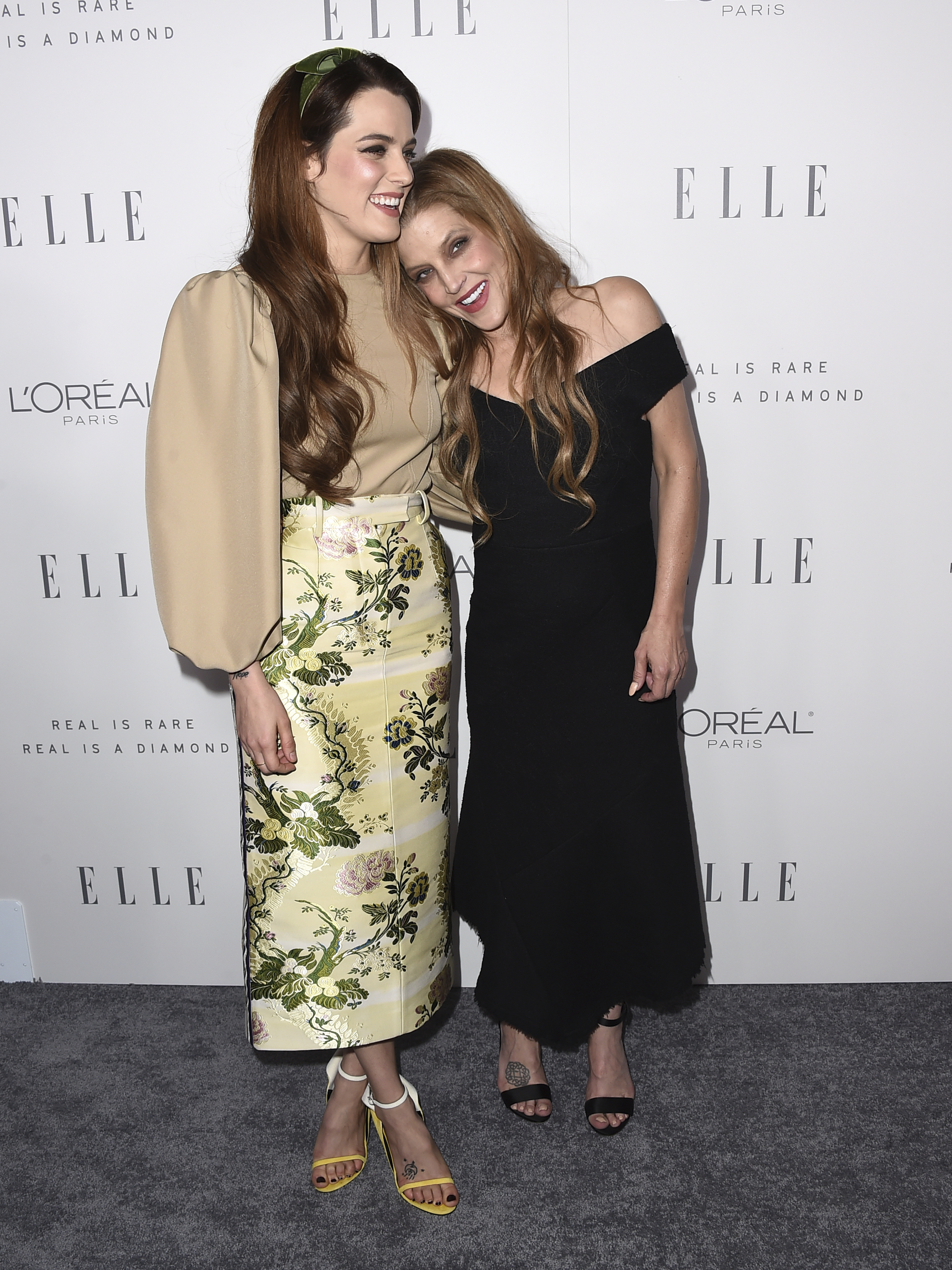 FILE – Riley Keough, left, and her mother Lisa Marie Presley arrive at the 24th Annual ELLE Women Awards in Hollywood on October 16, 2017 in Los Angeles.  Presley, singer-songwriter, Elvis's only descendant and dedicated guardian of her father's legacy, died on January 12, 2023, after being hospitalized, her mother Priscilla Presley said.  She was 54 years old.  (Photo Jordan Strauss/Invision/AP, File)