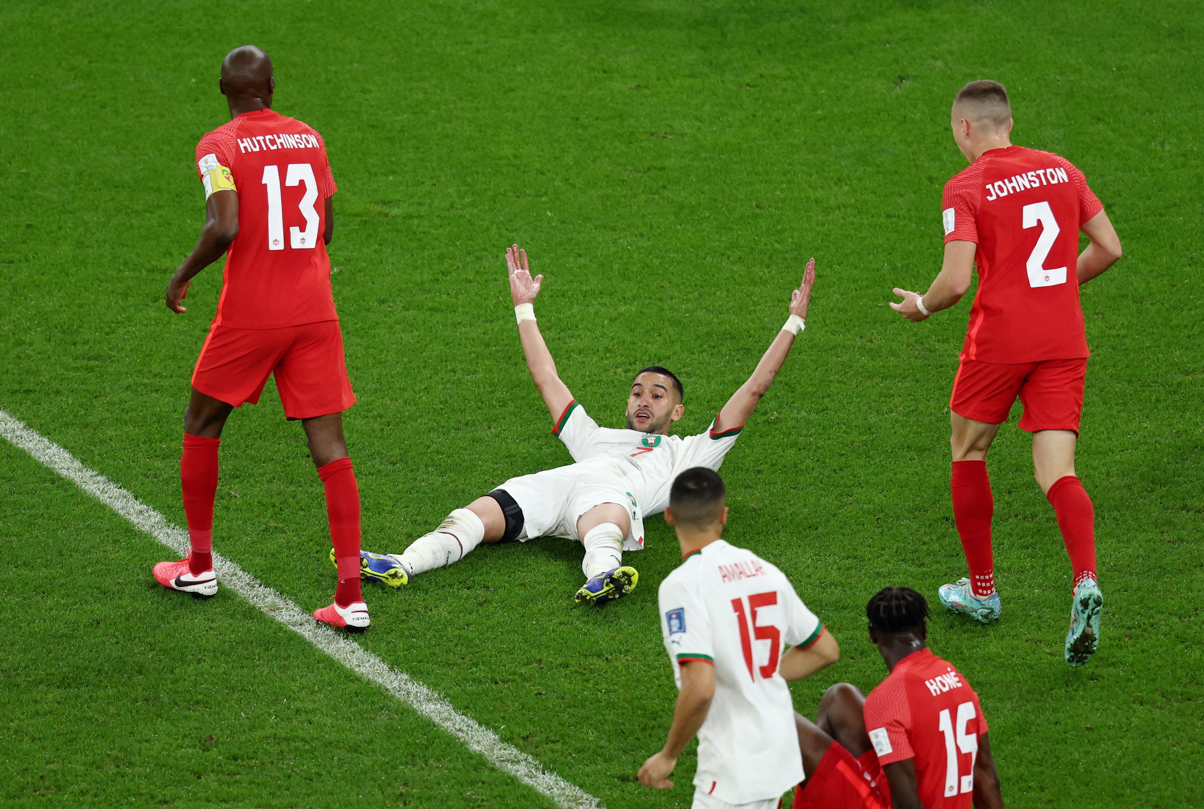 Hakim Ziyech claiming a possible fault in the opposing area.  REUTERS/Marko Djurica