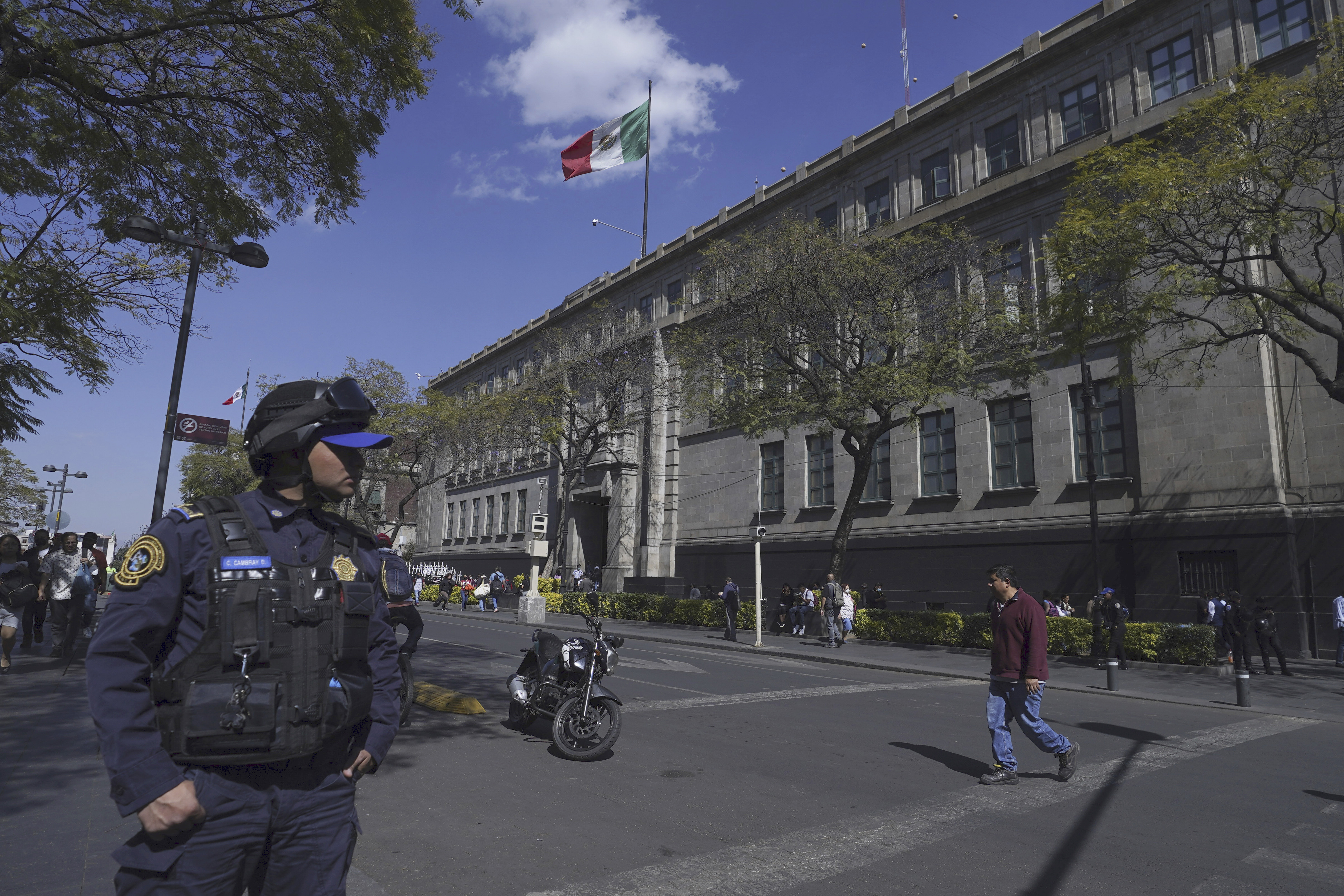 FILE - A police officer guards the building of the Supreme Court of Justice in Mexico City, on January 23, 2023. The Court discusses on Monday, May 8, 2023, the possible invalidation of part of an electoral reform promoted by the President Andrés Manuel López Obrador.  (AP Photo/Marco Ugarte, File)