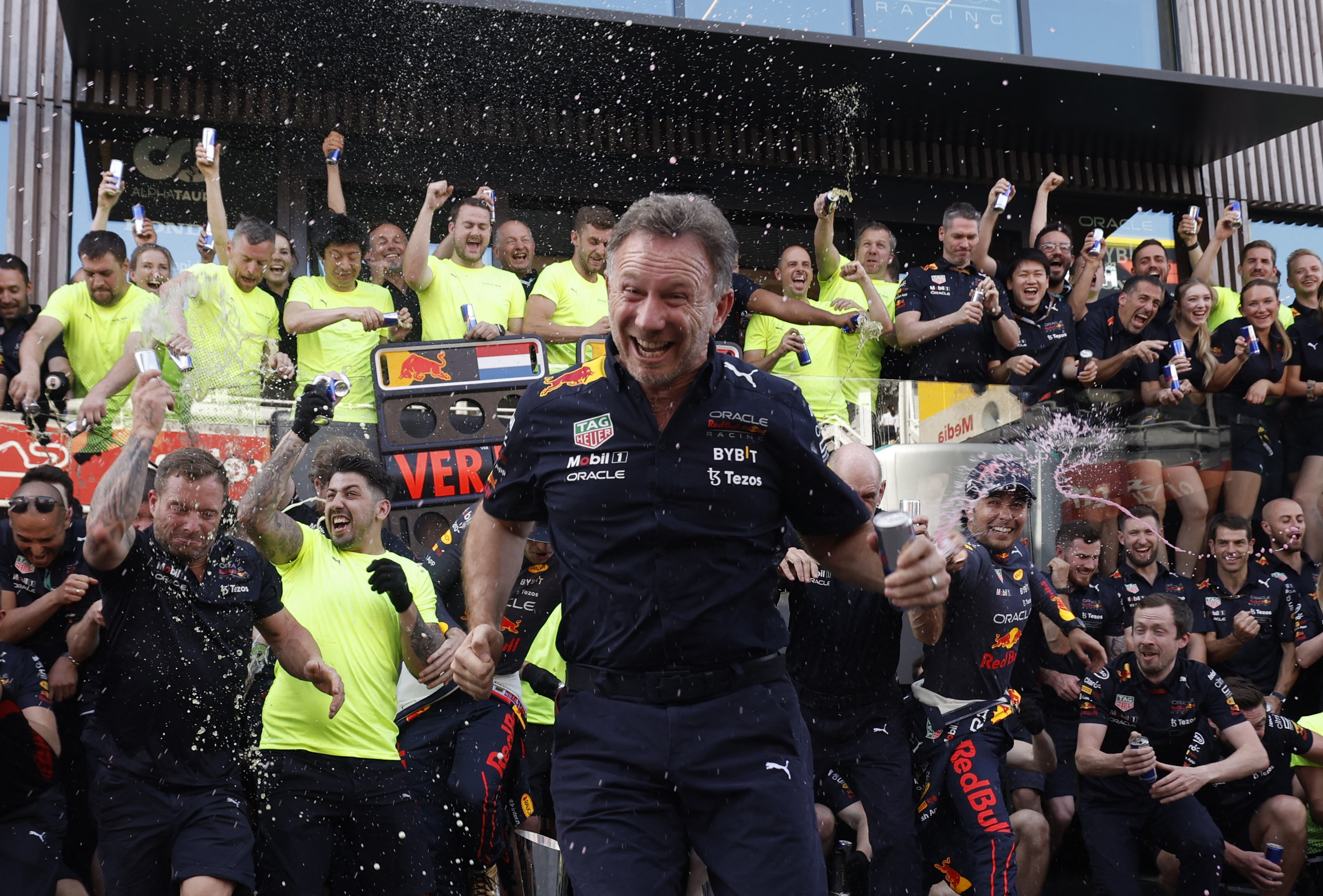Formula One F1 - Spanish Grand Prix - Circuit de Barcelona-Catalunya, Barcelona, Spain - May 22, 2022 Team principal Christian Horner celebrates with the Red Bull team after drivers Max Verstappen and Sergio Perez finish in first and second place REUTERS/Albert Gea