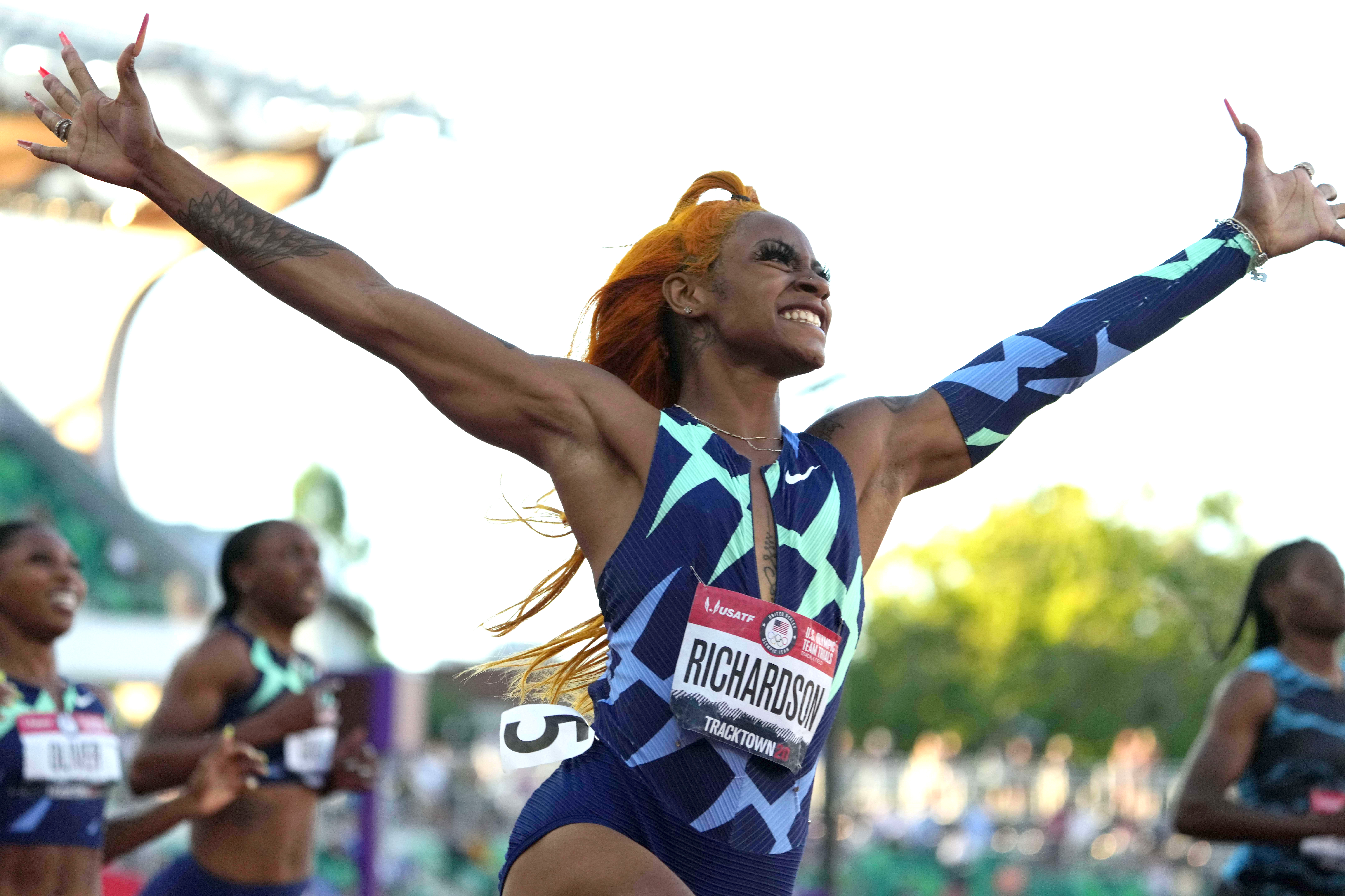 Jun 19, 2021; Eugene, OR, USA; Sha'Carri Richardson celebrates after winning the women's 100m in 10.86 during the US Olympic Team Trials at Hayward Field. Mandatory Credit: Kirby Lee-USA TODAY Sports