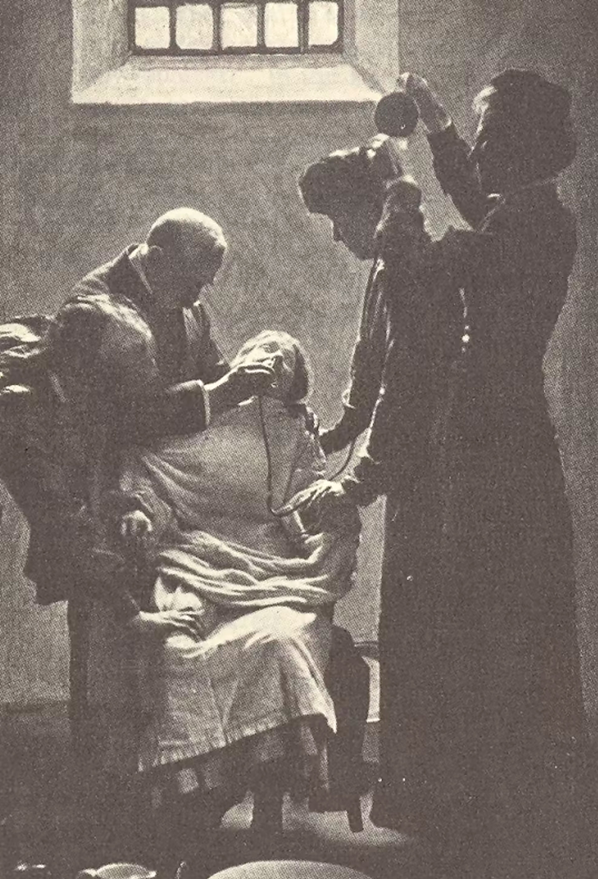 A suffragette on a hunger strike is force-fed with a nose tube (The Conversation)