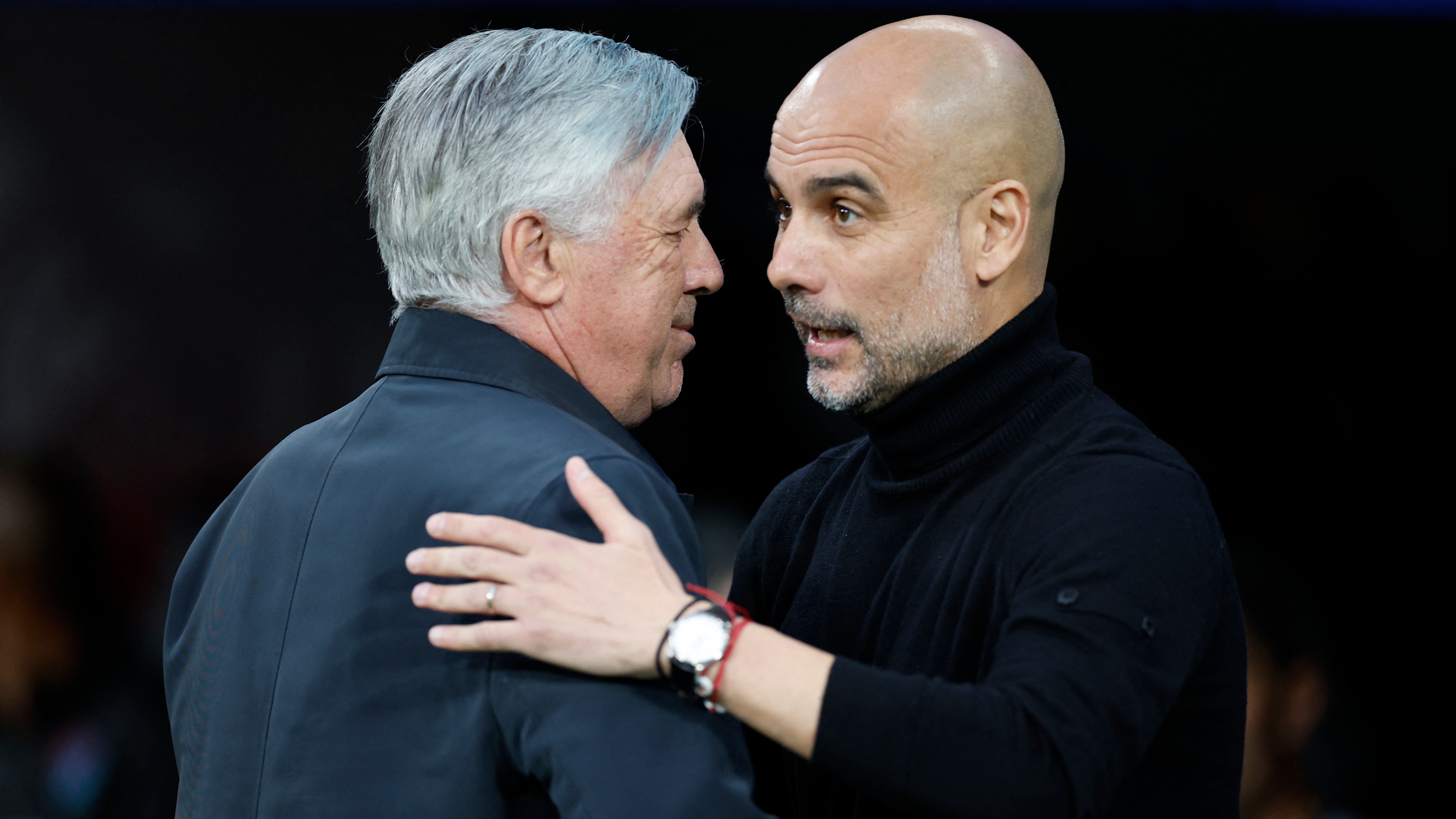 Soccer Football - Champions League - Semi Final - Second Leg - Real Madrid v Manchester City - Santiago Bernabeu, Madrid, Spain - May 4, 2022 Real Madrid coach Carlo Ancelotti with Manchester City manager Pep Guardiola before the match REUTERS/Juan Medina