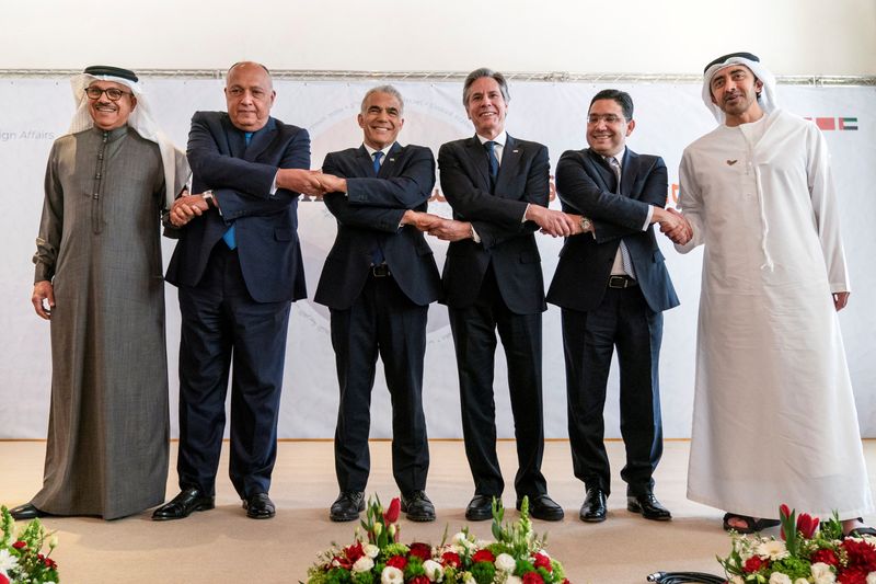 File Image: Bahraini Foreign Minister Abdullatif bin Rashid al-Zayani, Egyptian Foreign Minister Sameh Shoukry, Israeli Foreign Minister Yair Lapid, US Secretary of State Antony Blinken, Moroccan Foreign Minister Nasser Bourita, and United Arab Emirates Foreign Minister Sheikh Abdullah bin Zayed Al Nahyan pose for a photo during the Negev Summit in Sde Boker, Israel, March 28. 2022. REUTERS/Jacquelyn Martin