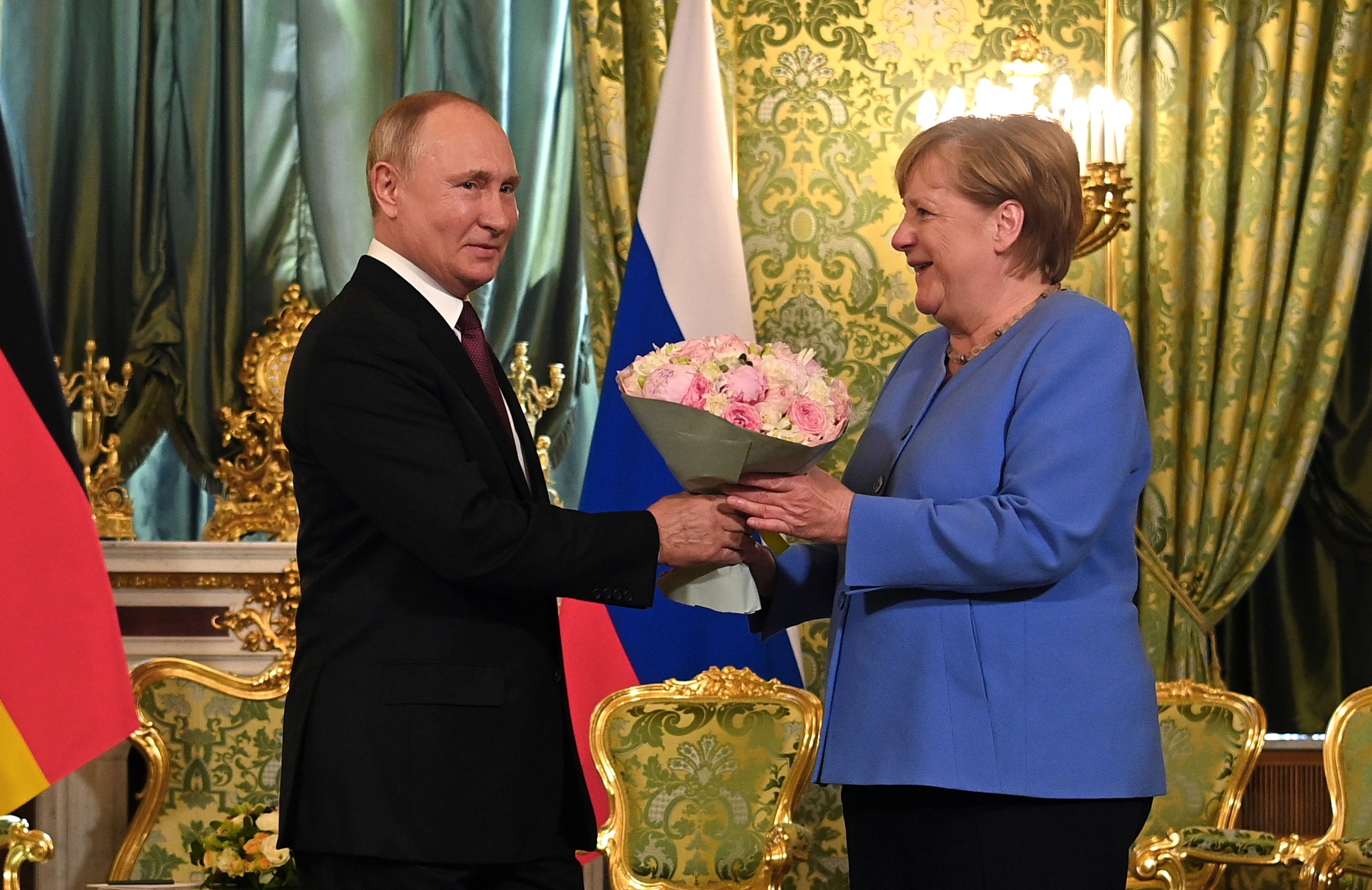 Vladímir Putin y Angela Merkel. EFE/EPA/SPUTNIK / KREMLIN / POOL/Archivo
