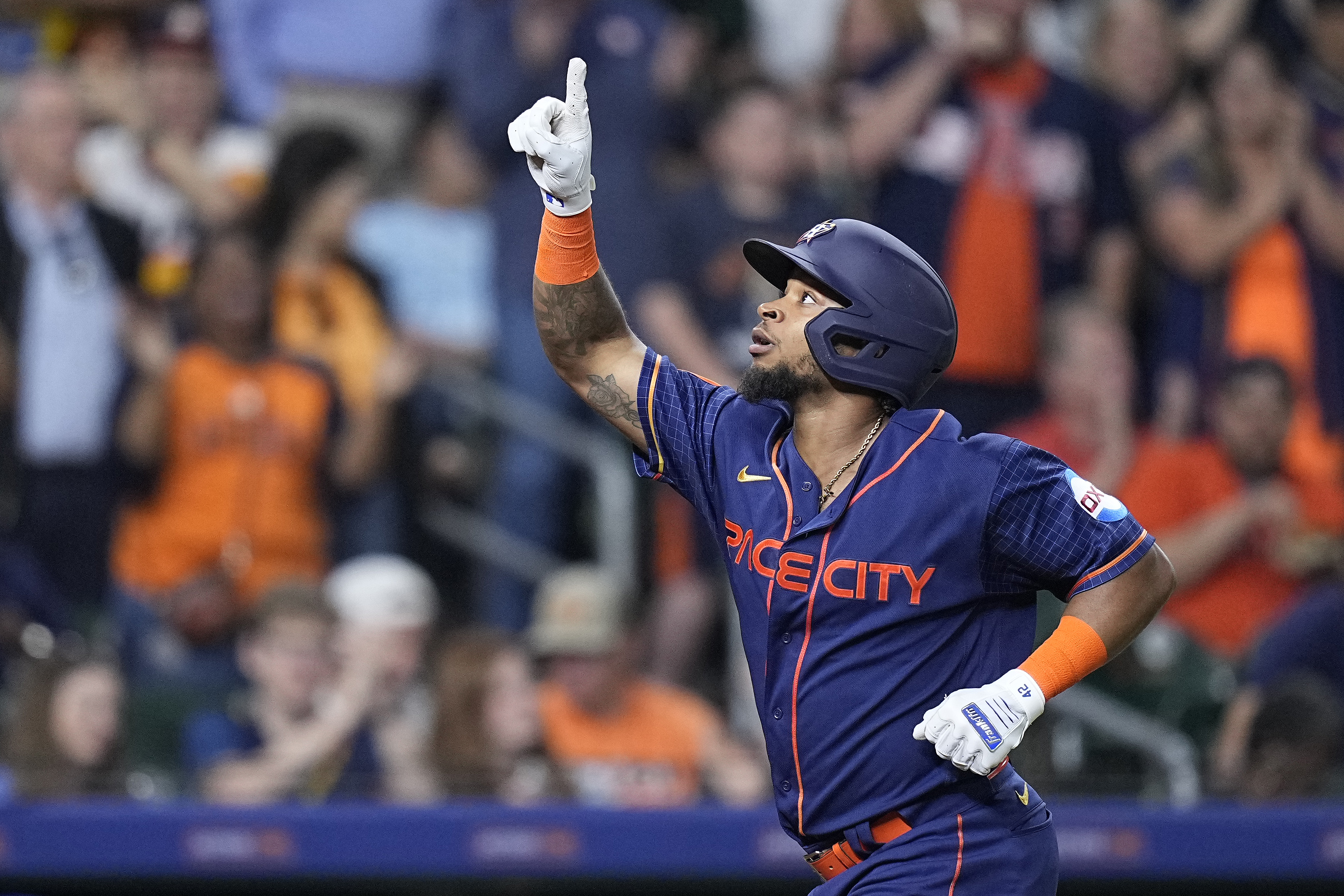 Houston Astros' Corey Julks celebrates after hitting a solo home run during the third inning of a baseball game against the Toronto Blue Jays, Monday, April 17, 2023, in Houston.  (AP Photo/Kevin M. Cox)