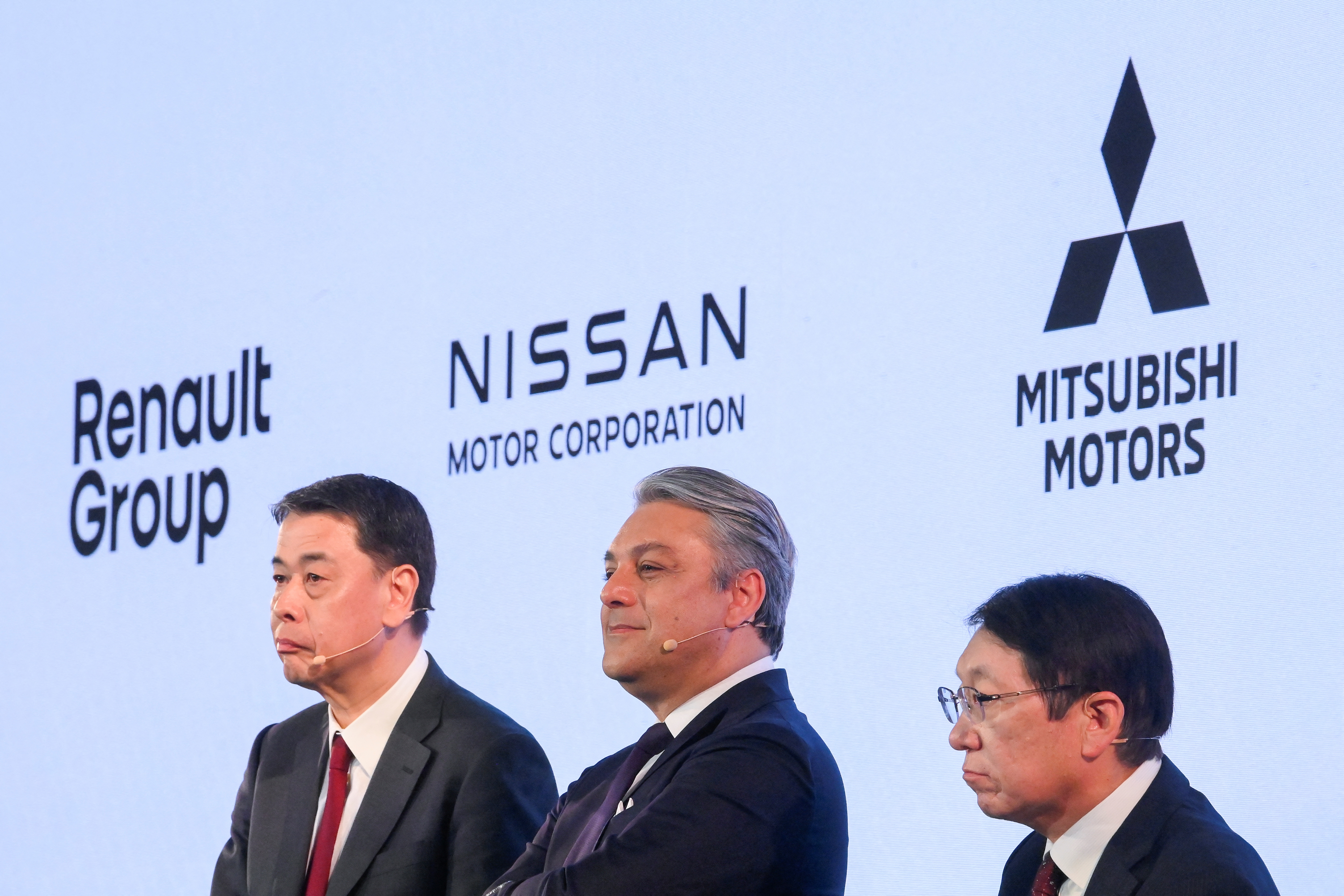 Los CEO de Nissan, Makoto Uchida, de Renault, Luca De Meo  y de Mitsubishi, Takao Kato, durante el anuncio del acuerdo entre las tres automotrices, realizado en Londres REUTERS/Toby Melville