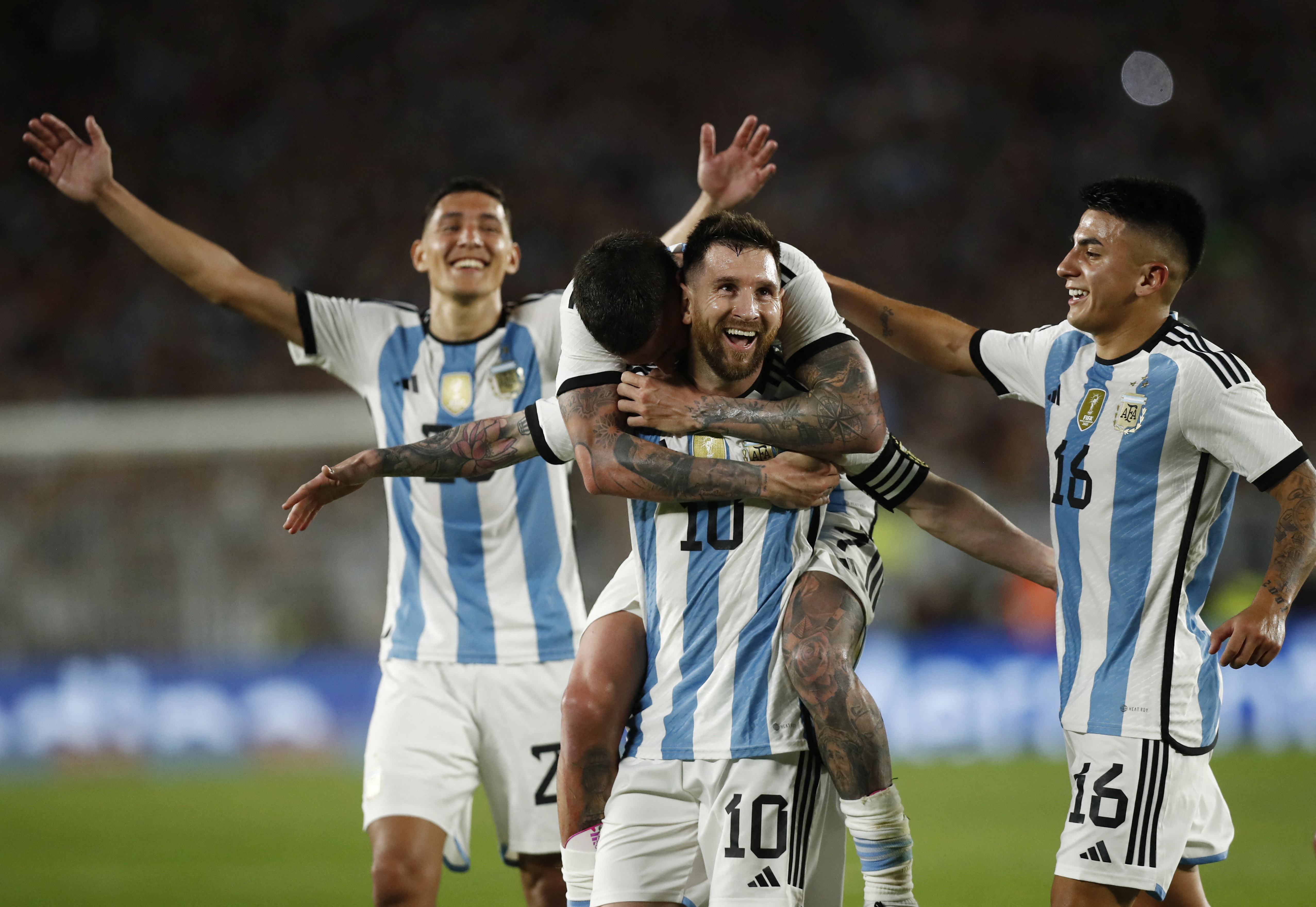Soccer Football - International Friendly - Argentina v Panama - Estadio Monumental, Buenos Aires, Argentina - March 23, 2023 Argentina's Lionel Messi celebrates scoring their second goal with teammates REUTERS/Agustin Marcarian