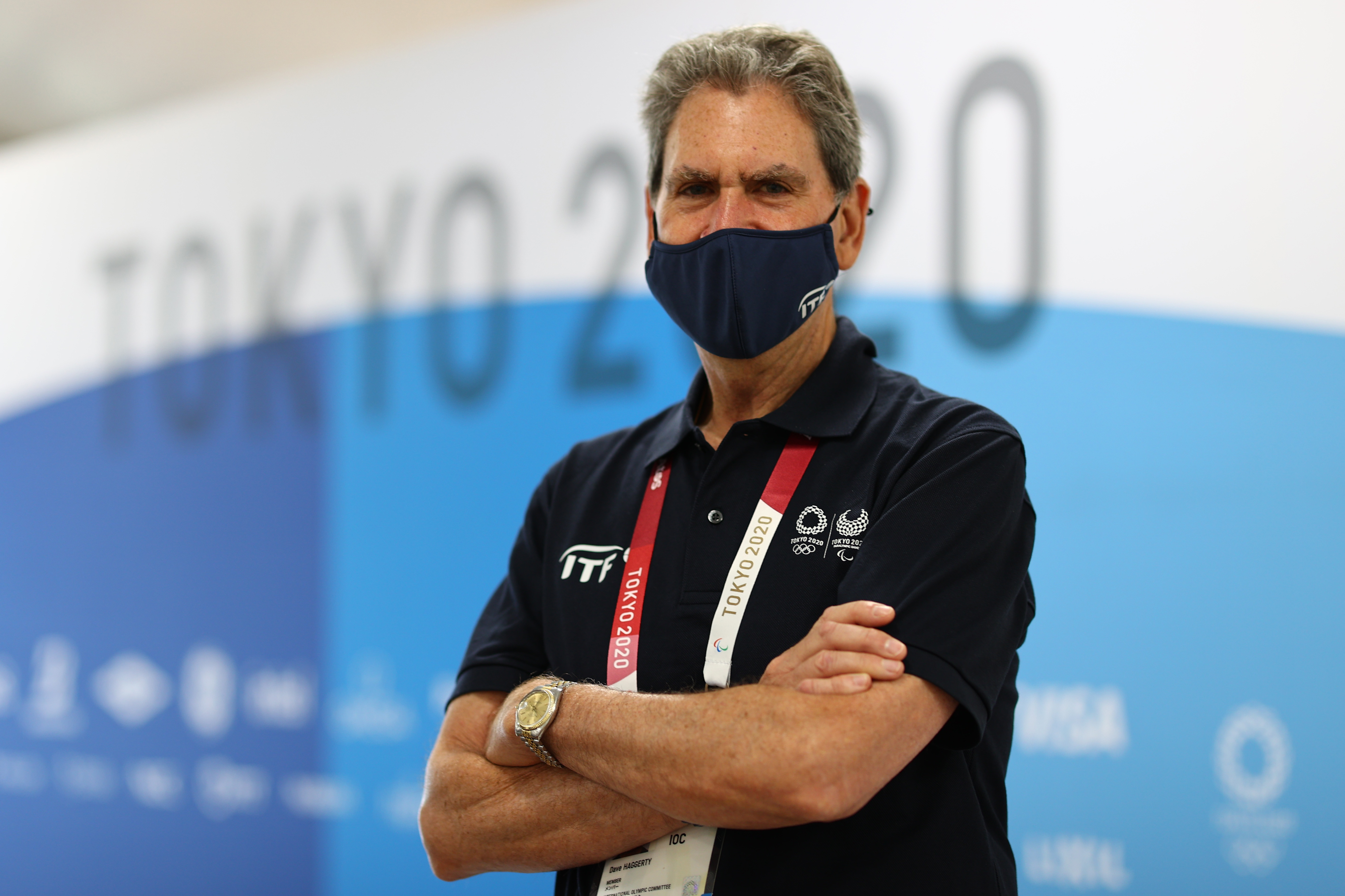 Tokyo 2020 Olympics - Tennis - Women's Singles - Round 1 - Ariake Tennis Park - Tokyo, Japan - July 24, 2021. XXX in action. International Tennis Federation (ITF) president David Haggerty wearing a mask poses for a picture REUTERS/Mike Segar