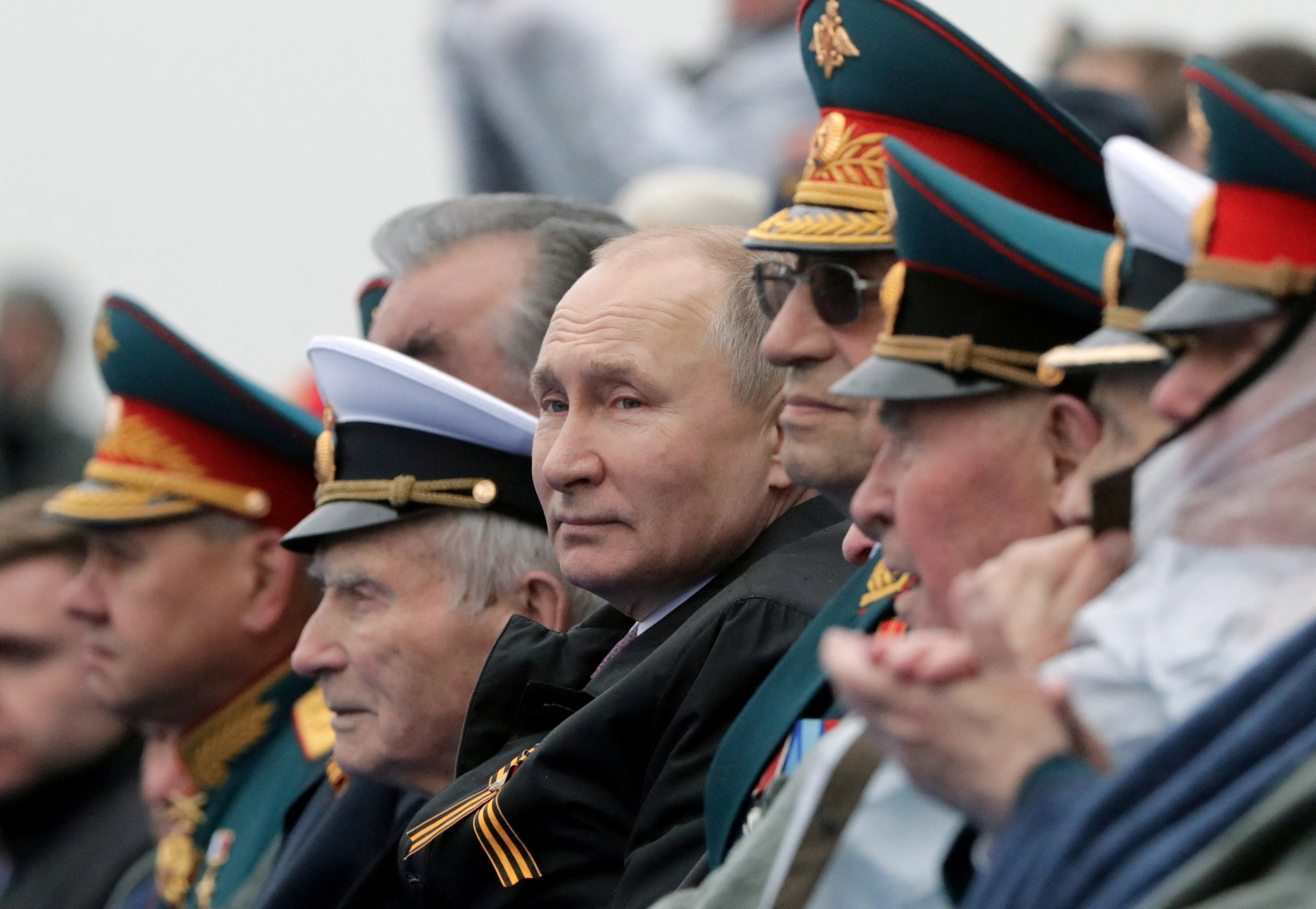 The head of the Kremlin surrounded by his military leadership (Sputnik/file)