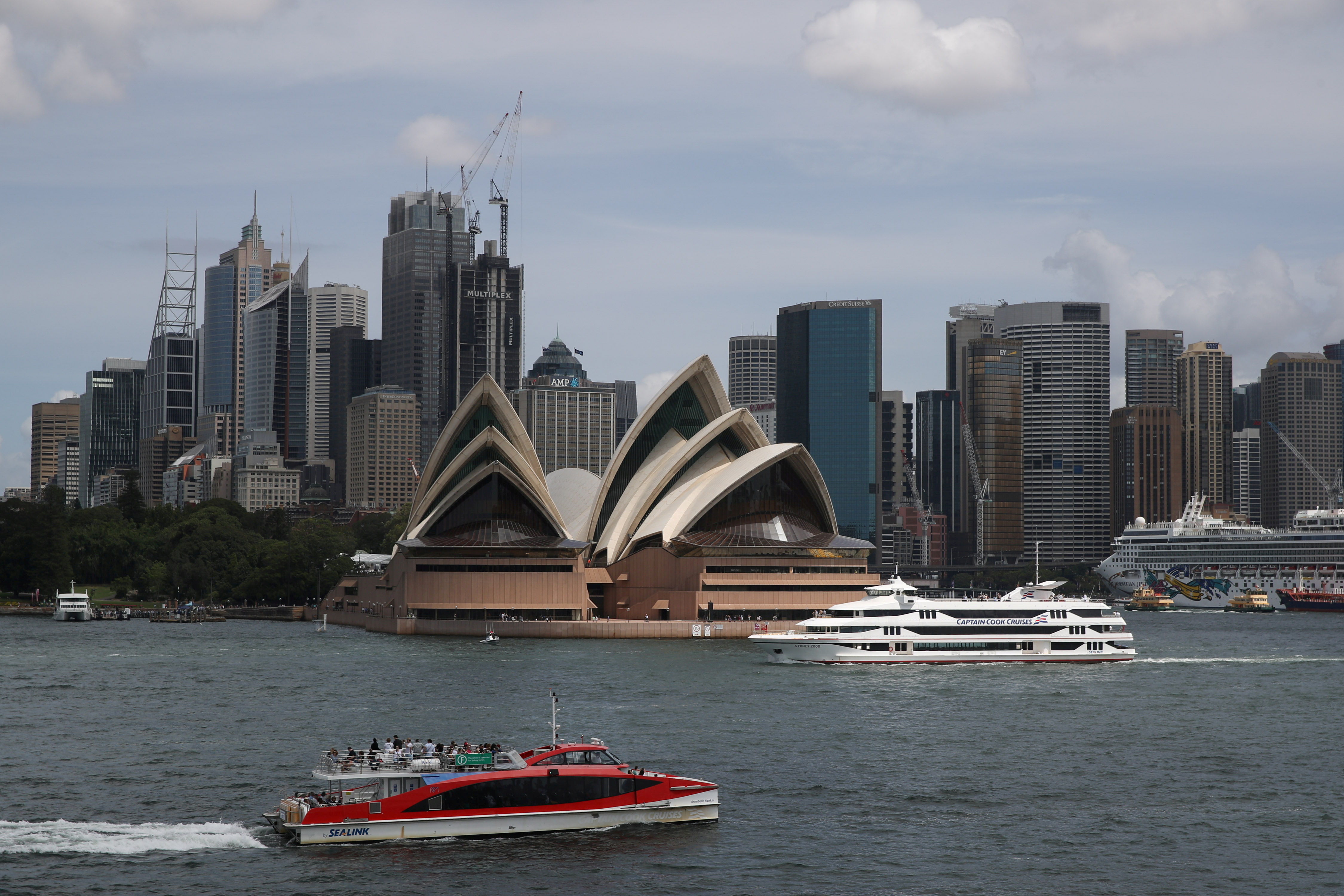 FILE PHOTO: The Sydney Opera House and city centre skyline are seen in Sydney, Australia, February 28, 2020.  REUTERS/Loren Elliott/File Photo