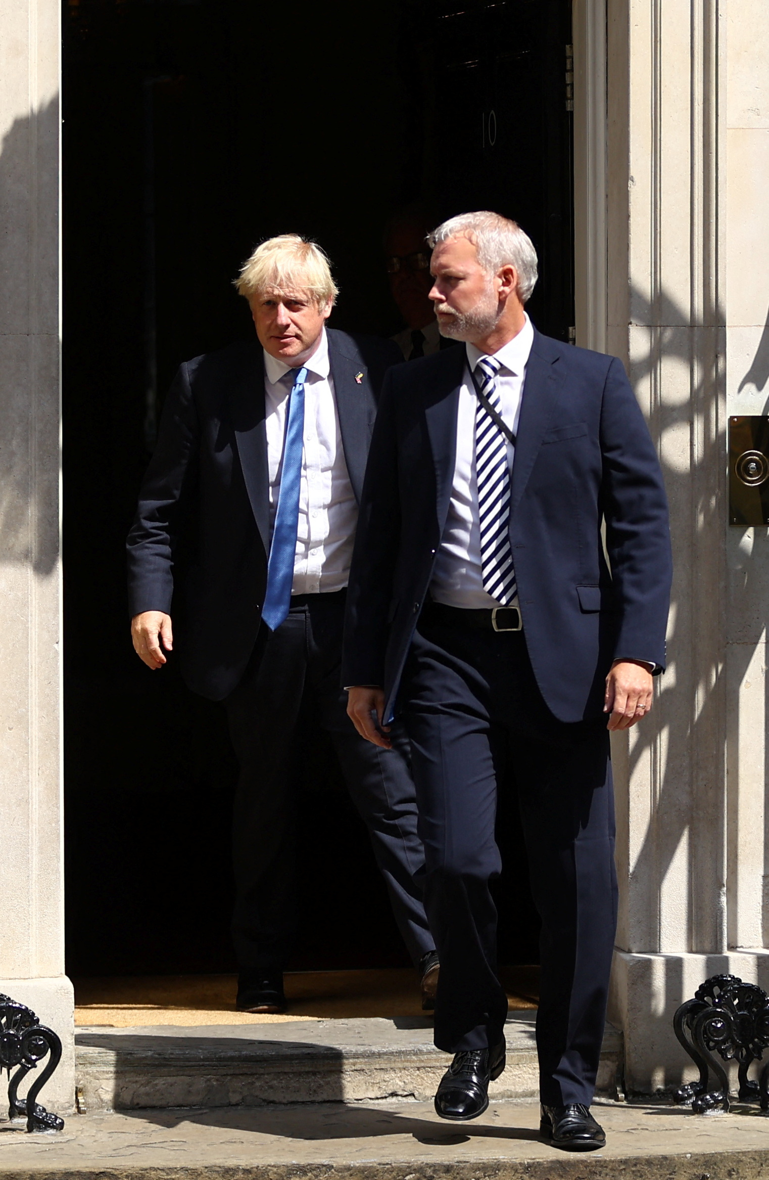 El primer ministro Boris Johnson se vio obligado a renunciar tras una ola de renuncias en su gabinete por los últimos escándalos que salpicaron al Gobierno (REUTERS/Hannah McKay)