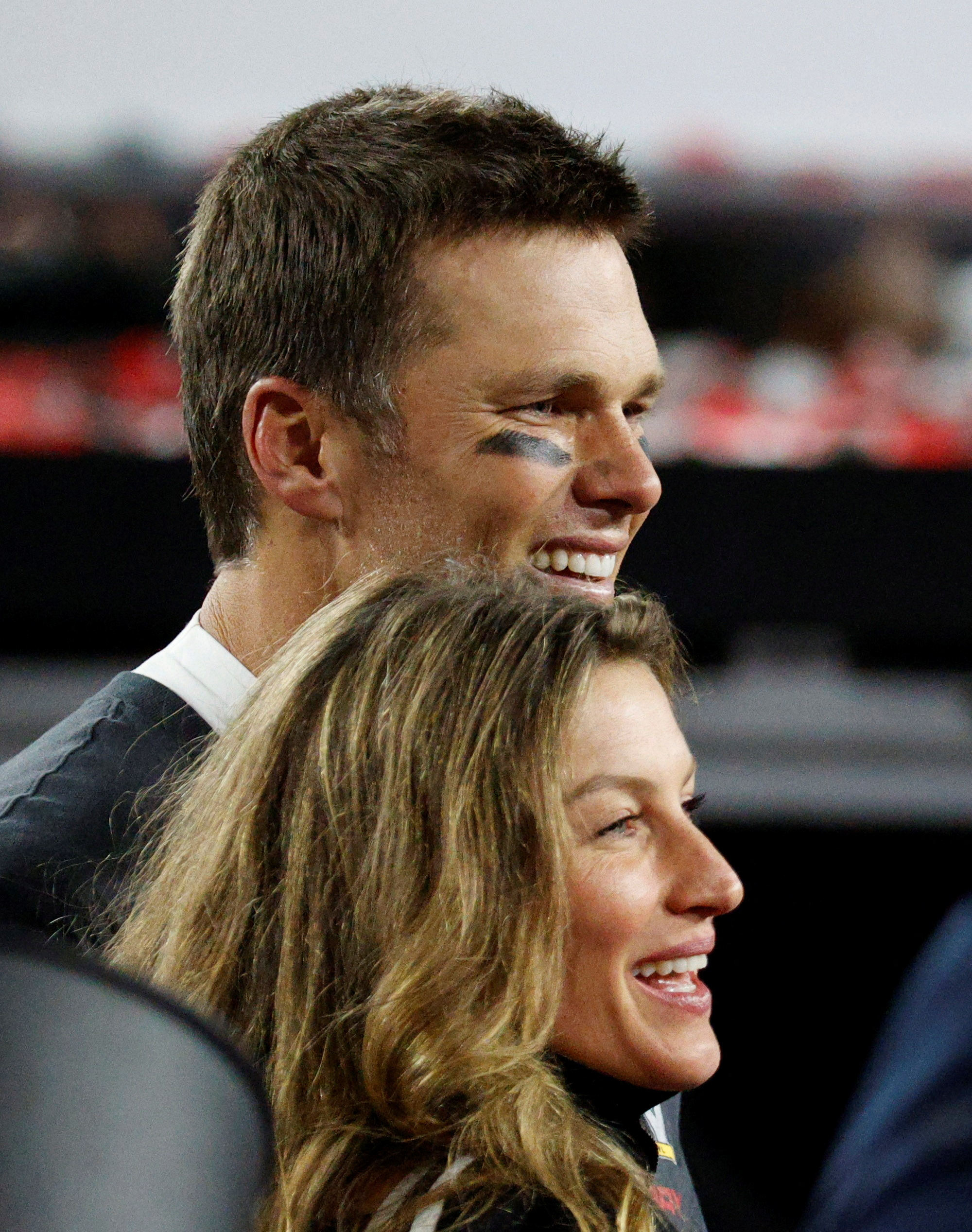 FILE PHOTO: NFL Football - Super Bowl LV - Tampa Bay Buccaneers v Kansas City Chiefs - Raymond James Stadium, Tampa, Florida, U.S. - February 7, 2021 Tampa Bay Buccaneers' Tom Brady and his wife Gisele Bundchen celebrates after winning the Super Bowl LV REUTERS/Eve Edelheit/File Photo