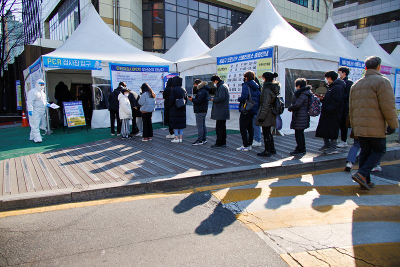 FILE PHOTO: A queue for COVID-19 testing at a public health center in Seoul, South Korea, February 24, 2022. REUTERS/Heo Ran