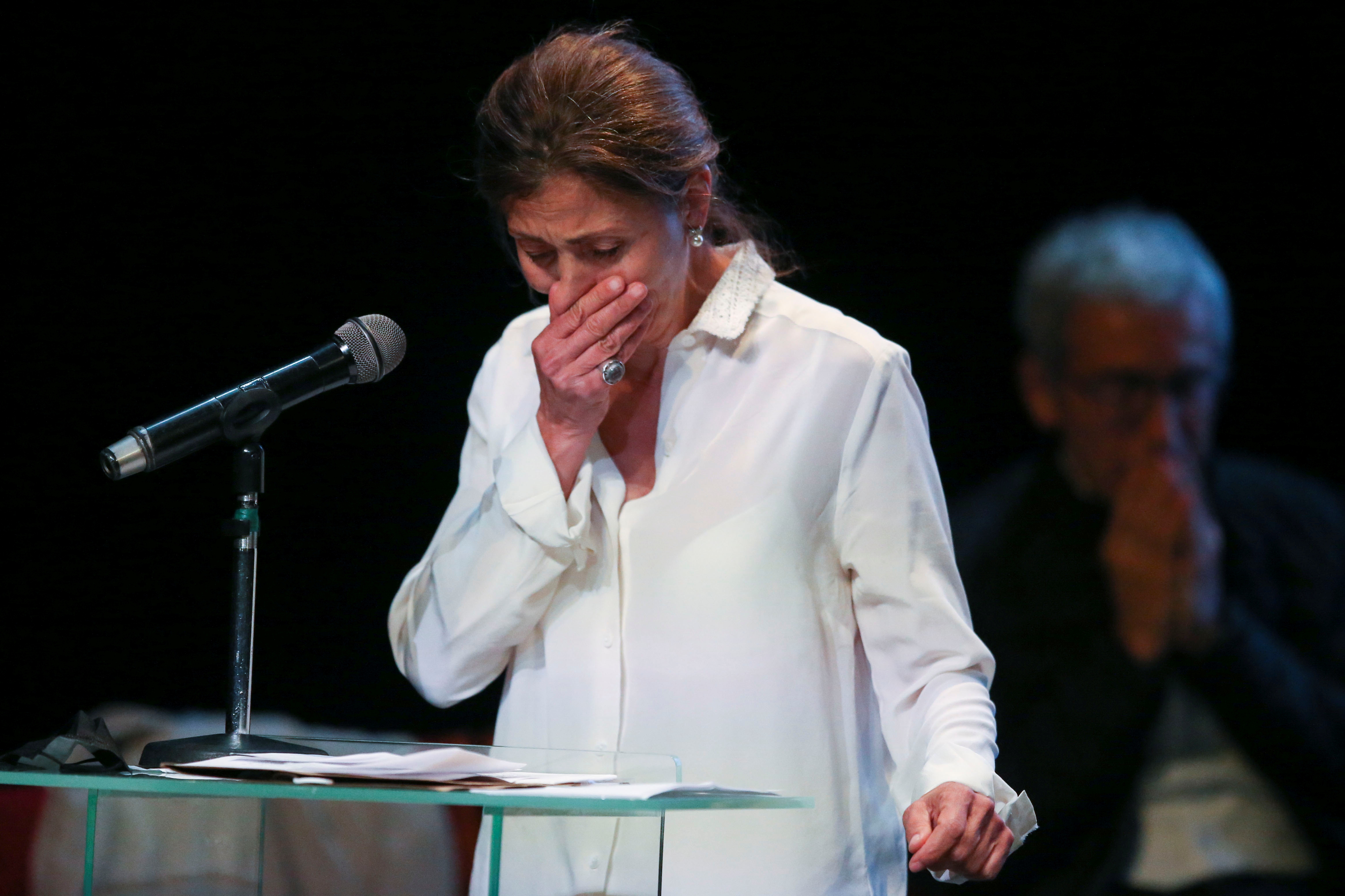 Ingrid Betancourt, French-Colombian politician and former FARC hostage, reacts as she speaks during an act of recognition with the participation of her kidnappers and their now political party Comunes, in Bogota, Colombia June 23, 2021. REUTERS/Luisa Gonzalez