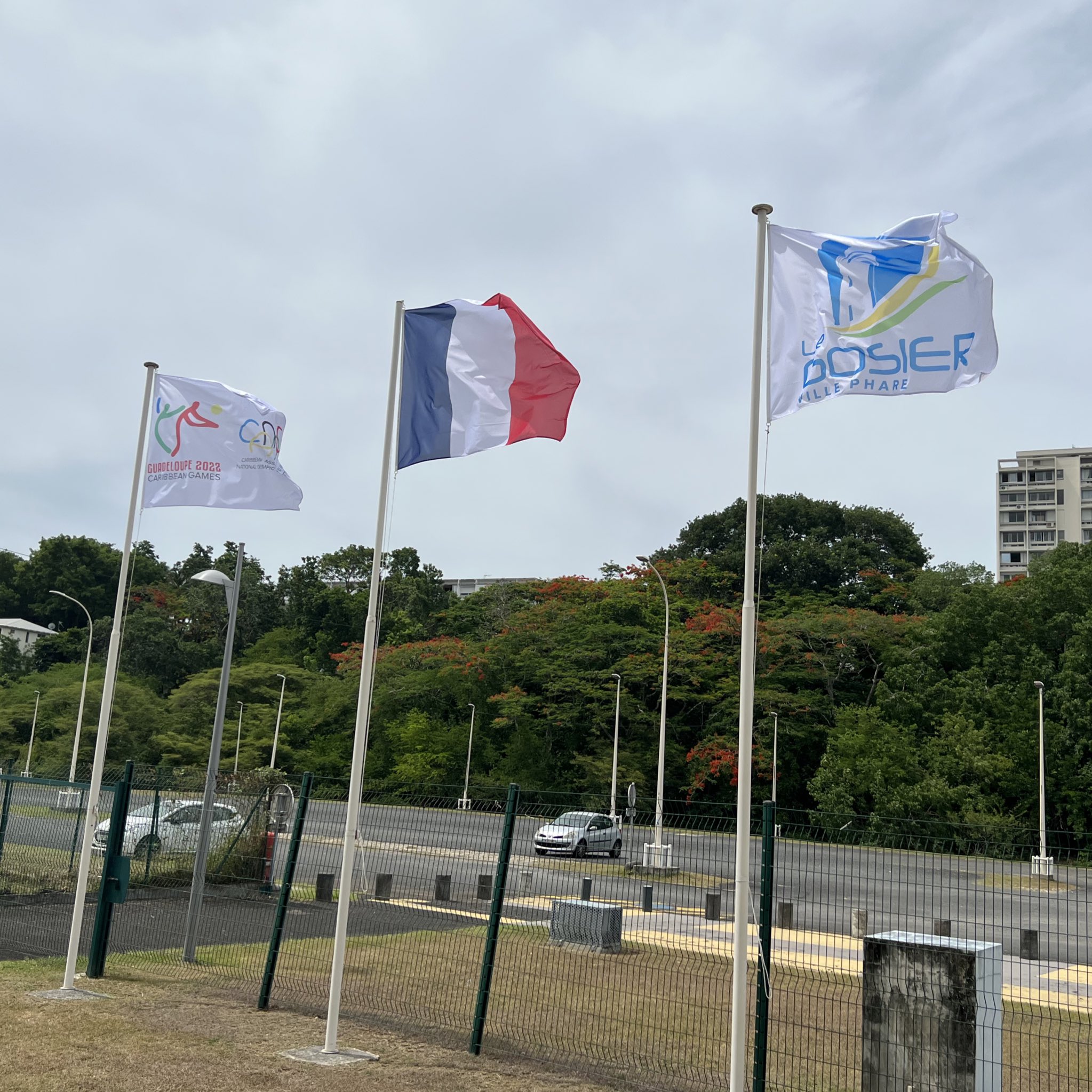 Flags fly ahead of the 2022 Caribbean Games. Photo Credit: CANOC