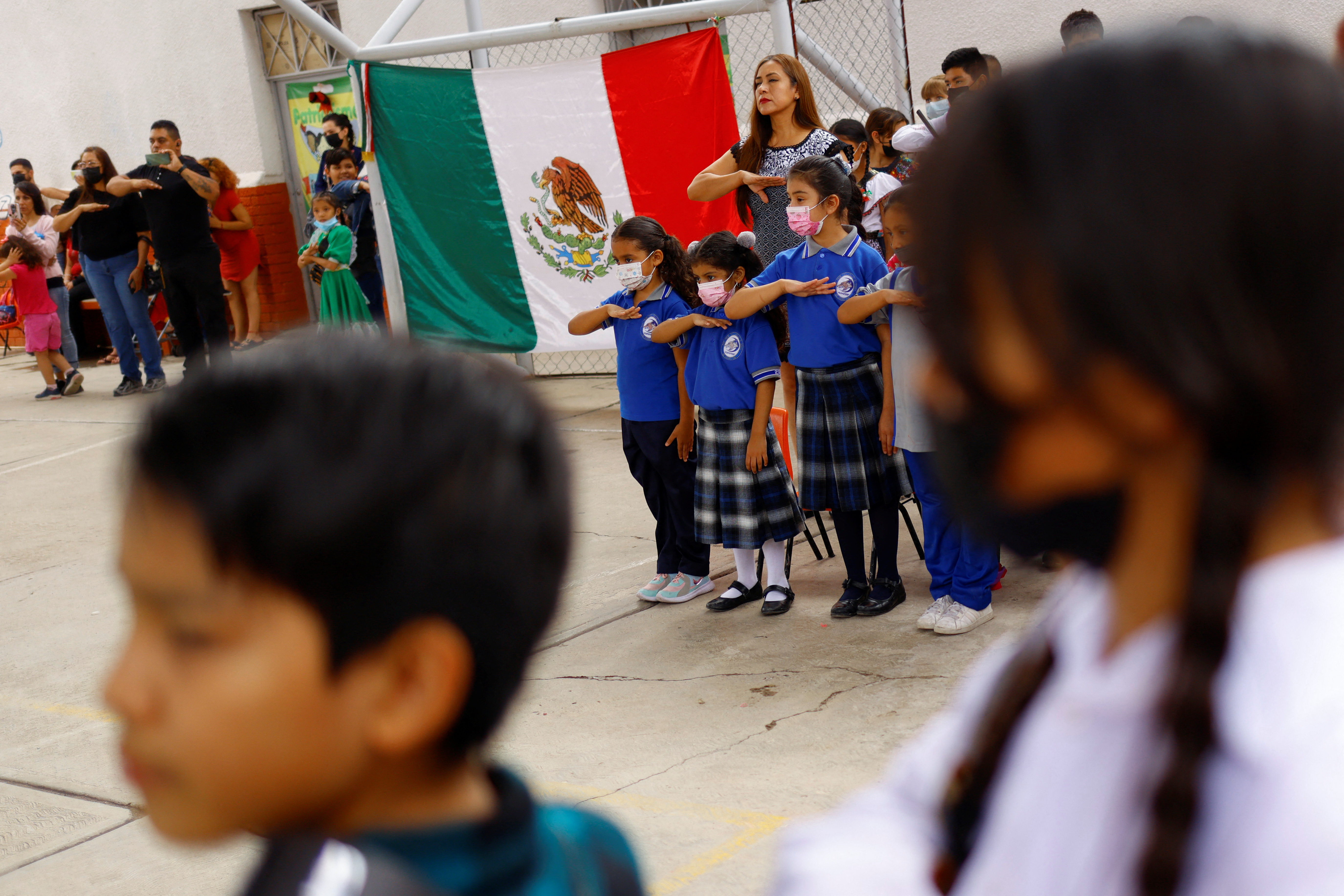 Students wearing protective masks attend a class in person as the coronavirus disease (COVID-19) outbreak continues, in Ciudad Juarez, Mexico June 21, 2022. Picture taken June 21, 2022. REUTERS/Jose Luis Gonzalez