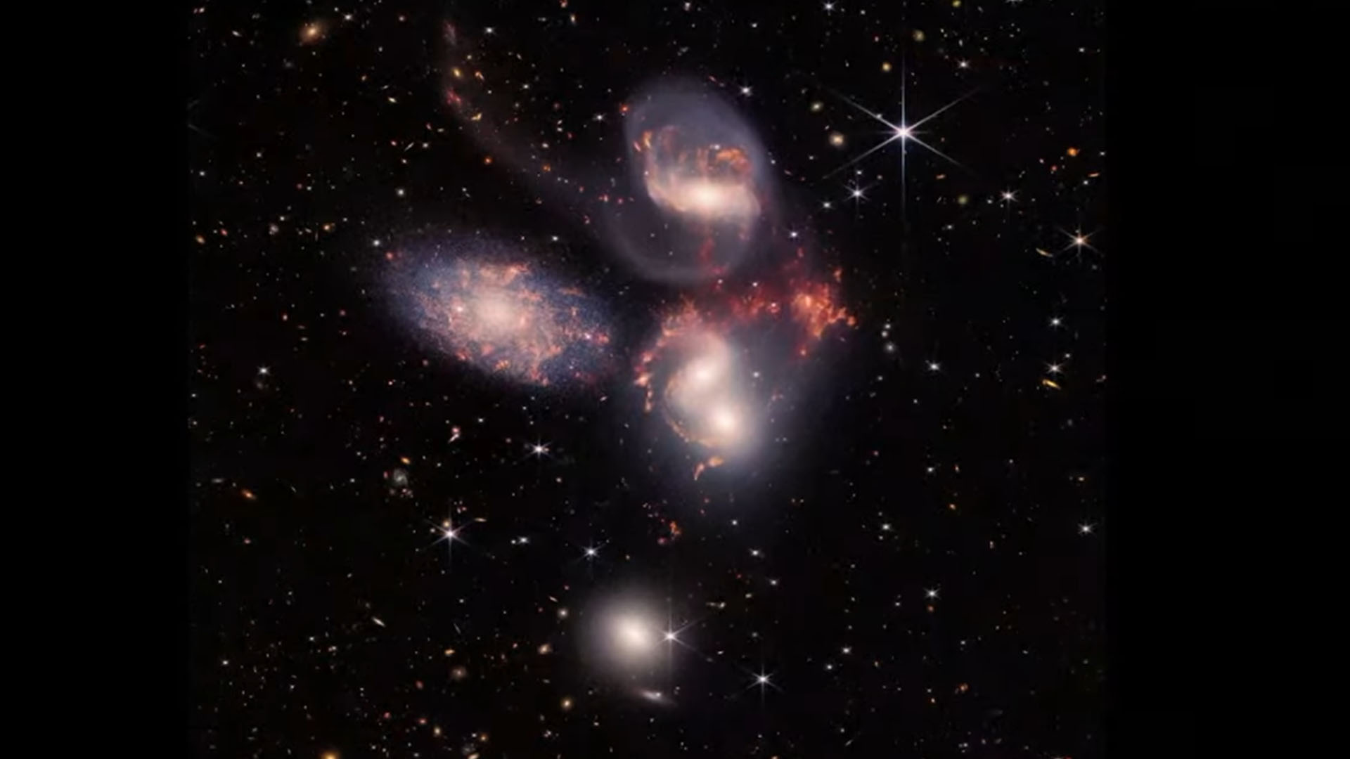 El quinteto de Stephan, que muestra cinco galaxias, cuatro de las cuales interactúan, chocan entre sí y tiran y estiran la gravedad de las demás. (Crédito...NASA, ESA, CSA y STScI)