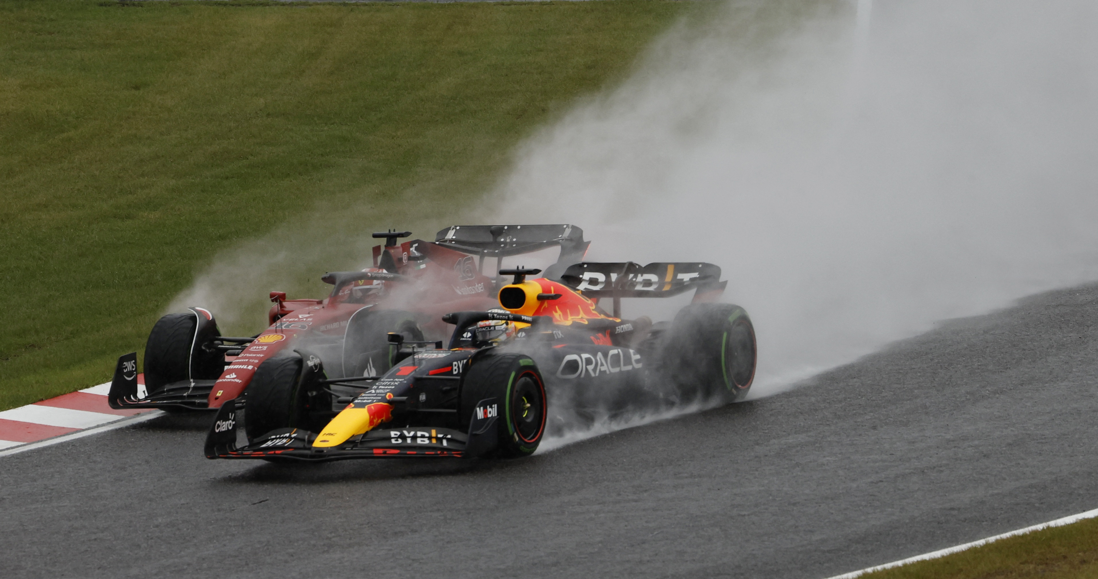 Max Verstappen fended off Charles Leclerc at the start of the race and held first position (REUTERS / Issei Kato)