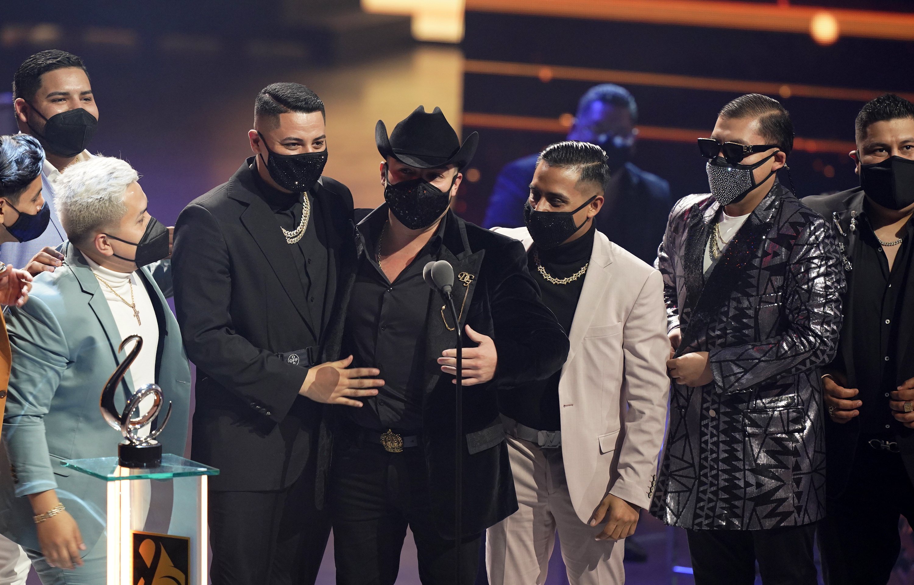 Lenin Ramirez and Grupo Firme accept the award for regional Mexican song of the year for "Yo Ya No Vuelvo Contigo" at Premio Lo Nuestro at American Airlines Arena on Thursday, Feb. 18, 2021, in Miami. (AP Photo/Marta Lavandier)