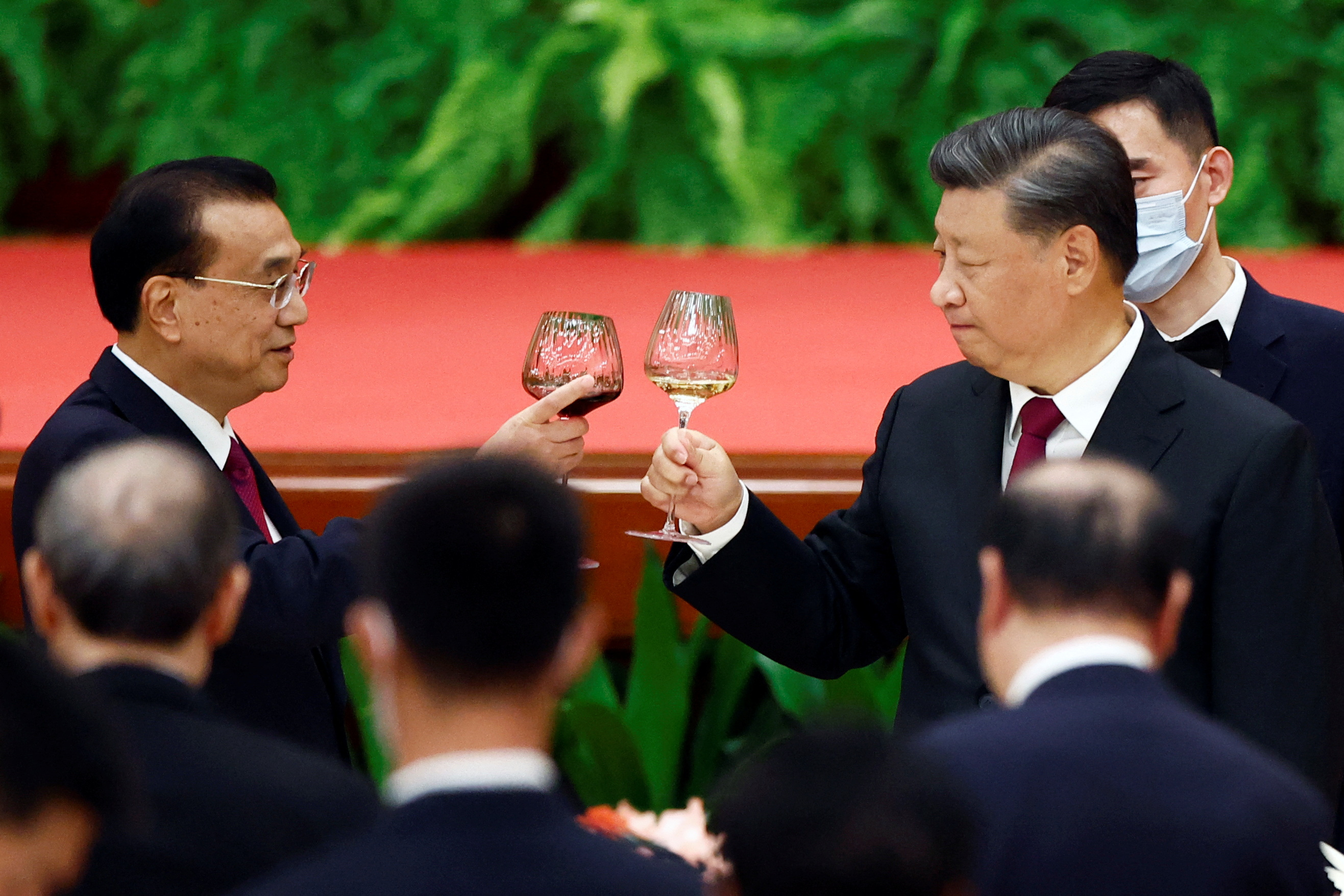 Li Keqiang brinda con Xi Jinping 