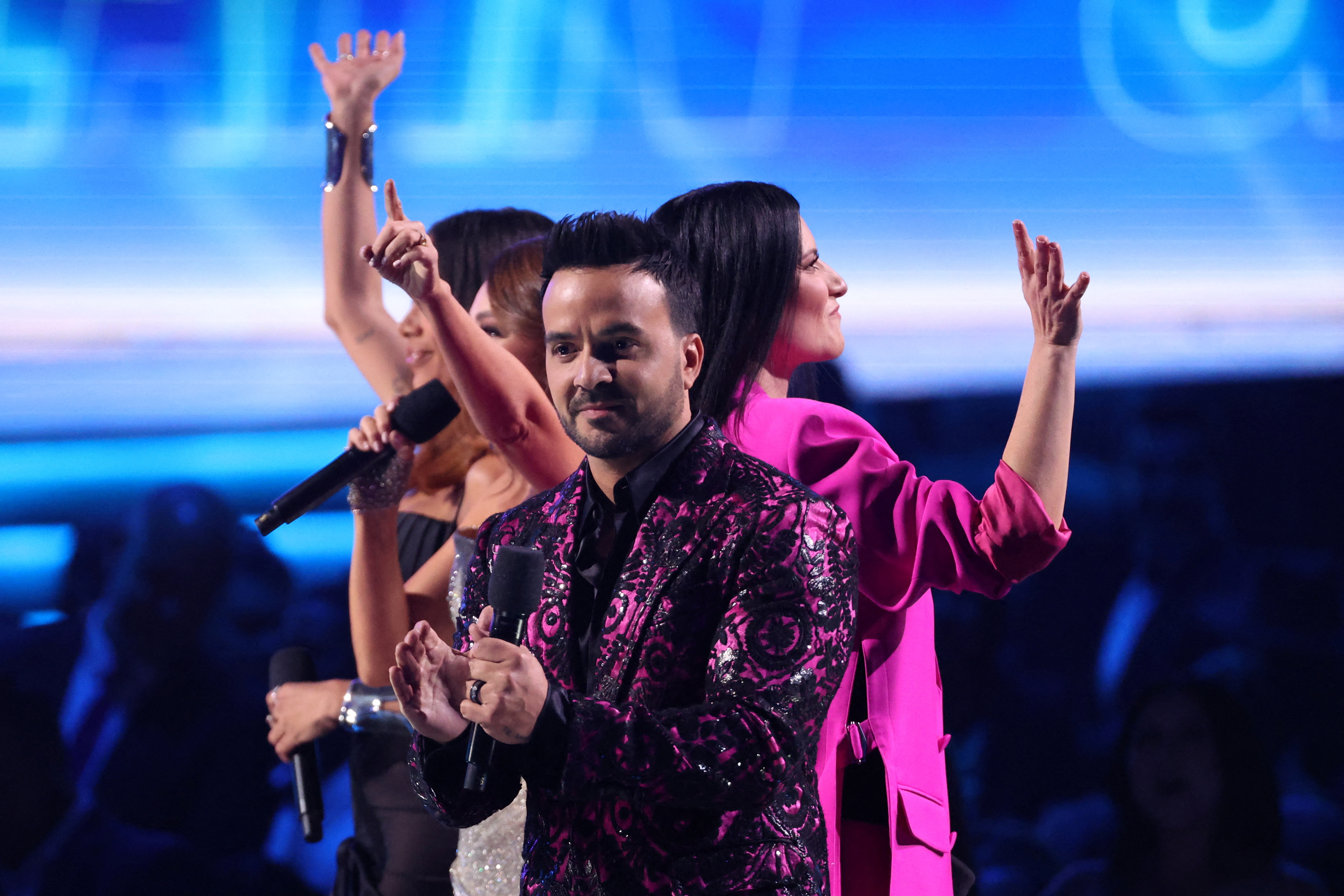 Laura Pausini, Luis Fonsi and Thalia greet the audience during the 23rd Annual Latin Grammy Awards show in Las Vegas, Nevada, U.S., November 17, 2022. REUTERS/Mario Anzuoni