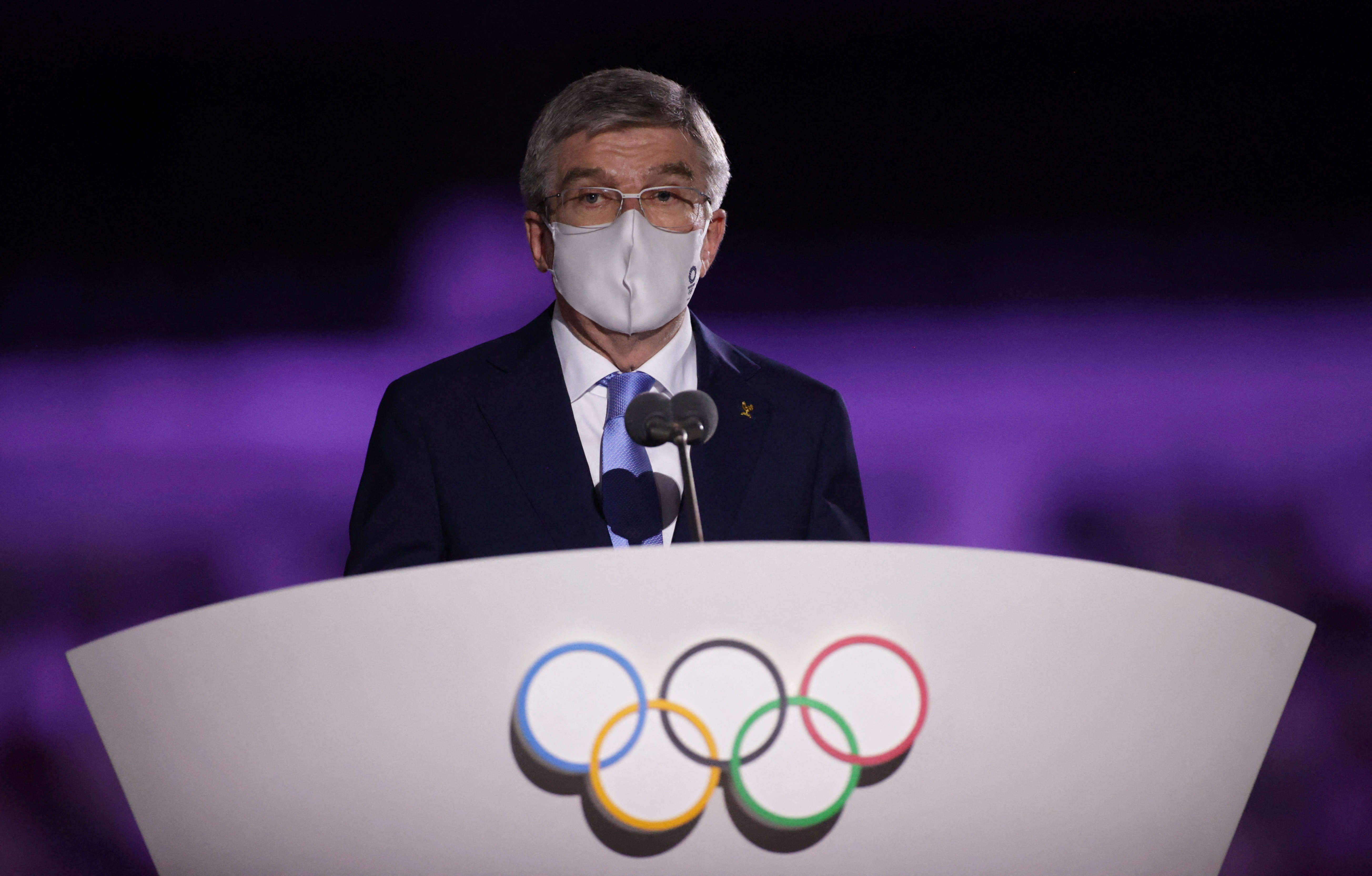 FILE PHOTO: Tokyo 2020 Olympics - The Tokyo 2020 Olympics Opening Ceremony - Olympic Stadium, Tokyo, Japan - July 23, 2021. International Olympic Committee (IOC) President Thomas Bach speaks during a speech at the opening ceremony REUTERS/Hannah Mckay/File Photo