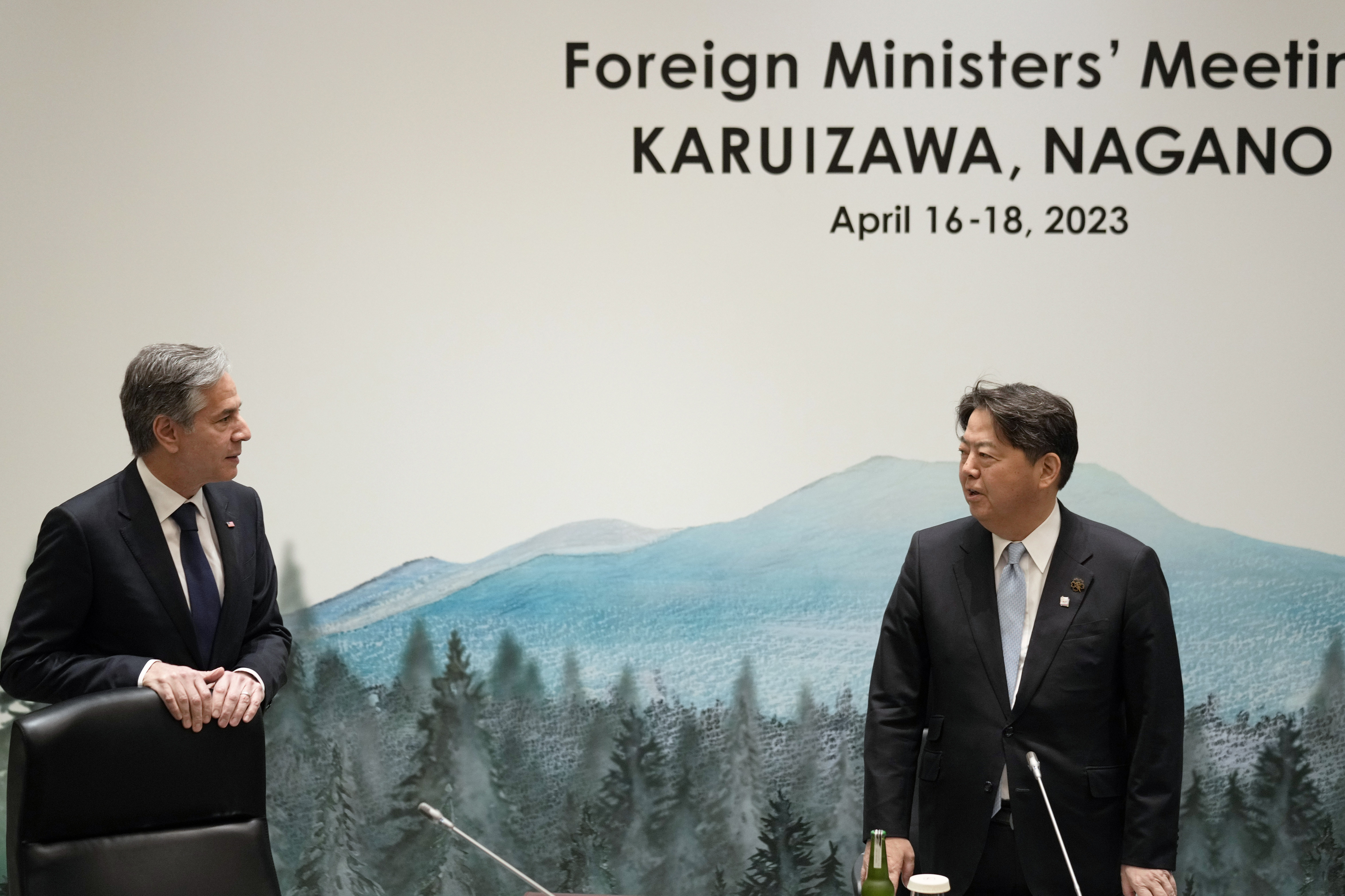 Japan's Foreign Minister Yoshimasa Hayashi, right, speaks with US Secretary of State Antony Blinken at the start of the first working session of the G7 foreign ministers meeting, Monday, April 17, 2023. , at a hotel in Karuizawa, in Nagano Prefecture, Japan.  (Franck Robichon/Pool Photo via AP)
