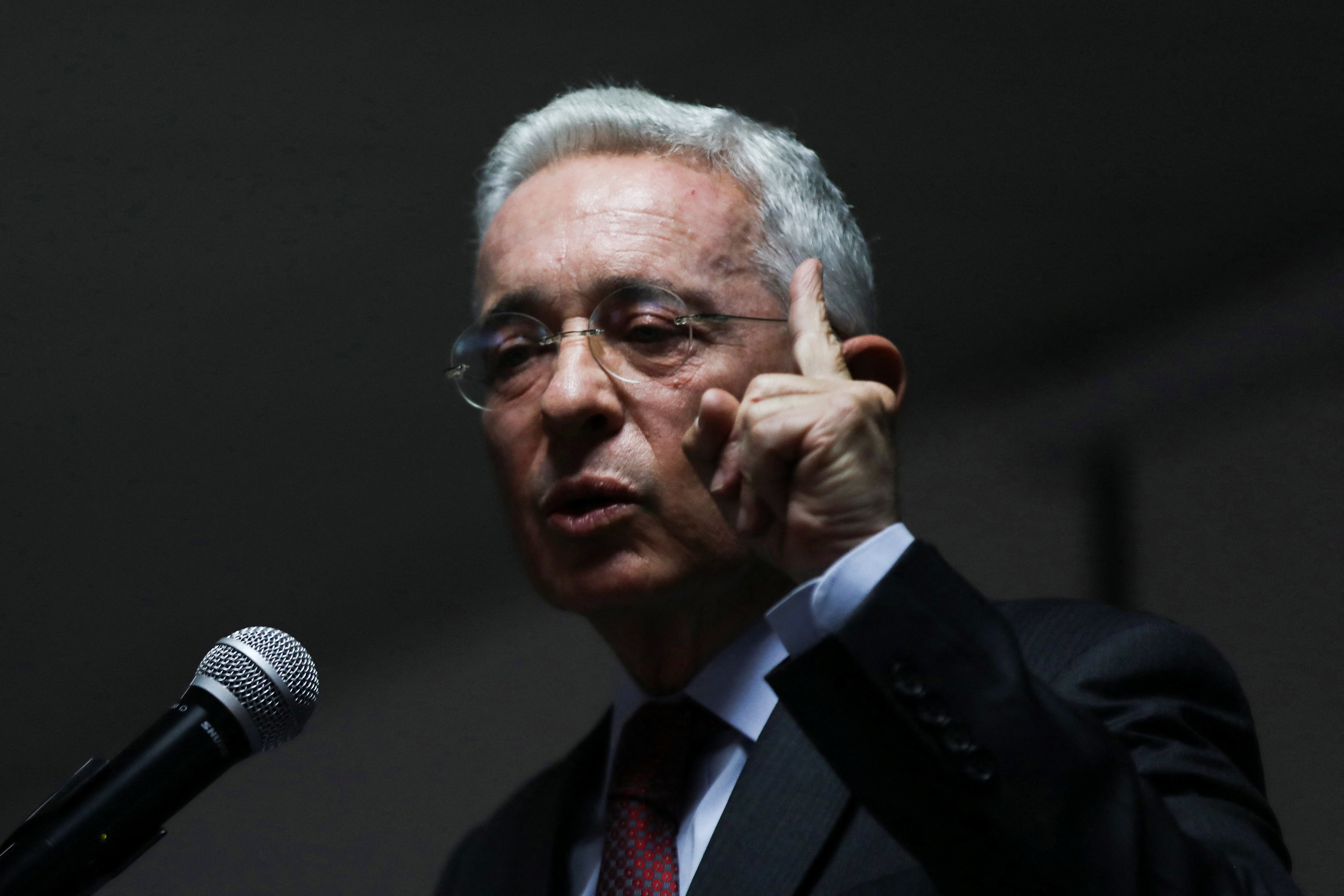 Colombia's former president Alvaro Uribe speaks during a news conference in Bogota, Colombia March 15, 2022. REUTERS/Luisa Gonzalez