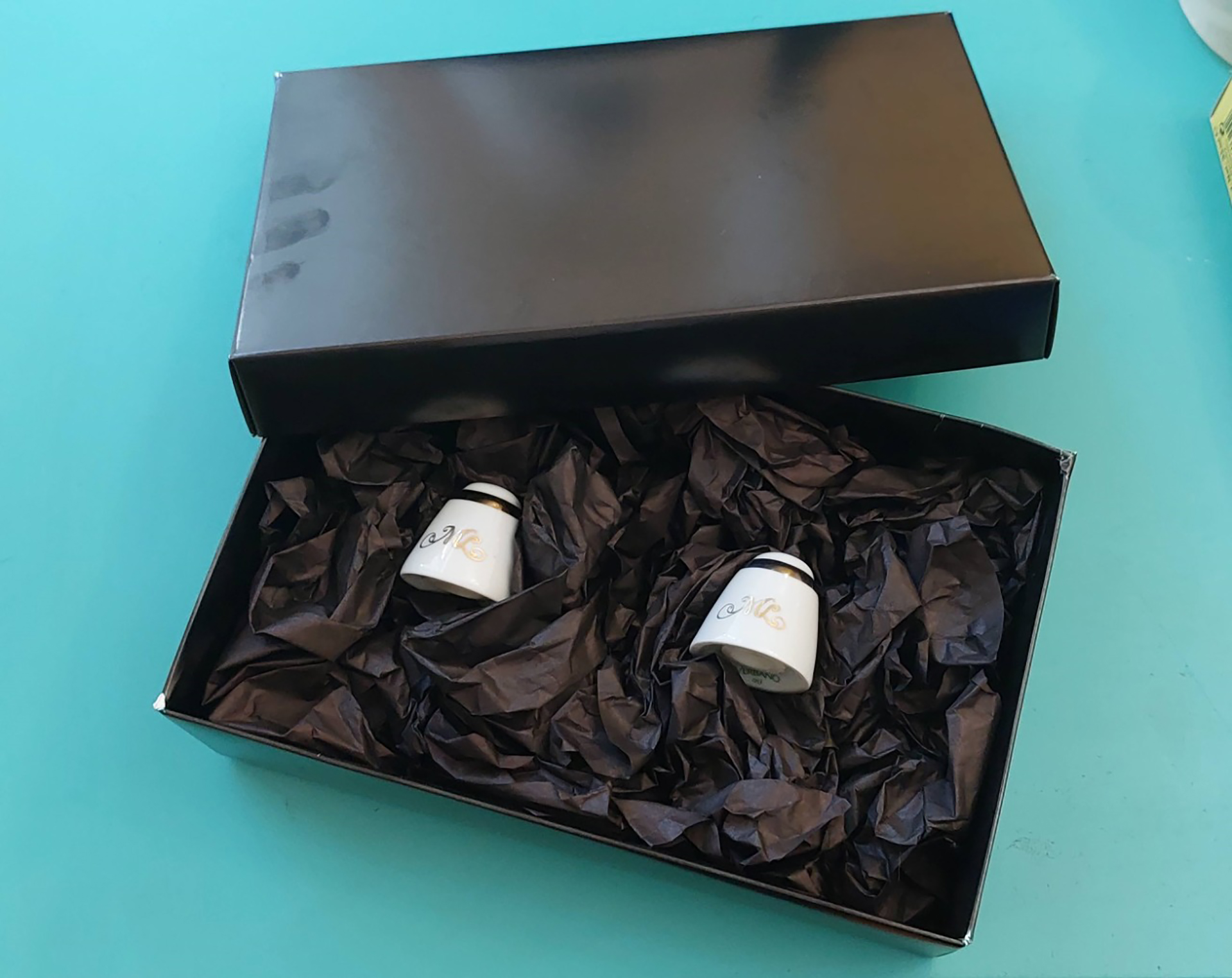 Daniel Malnatti put the ML salt shakers in a special black box for the buyer 