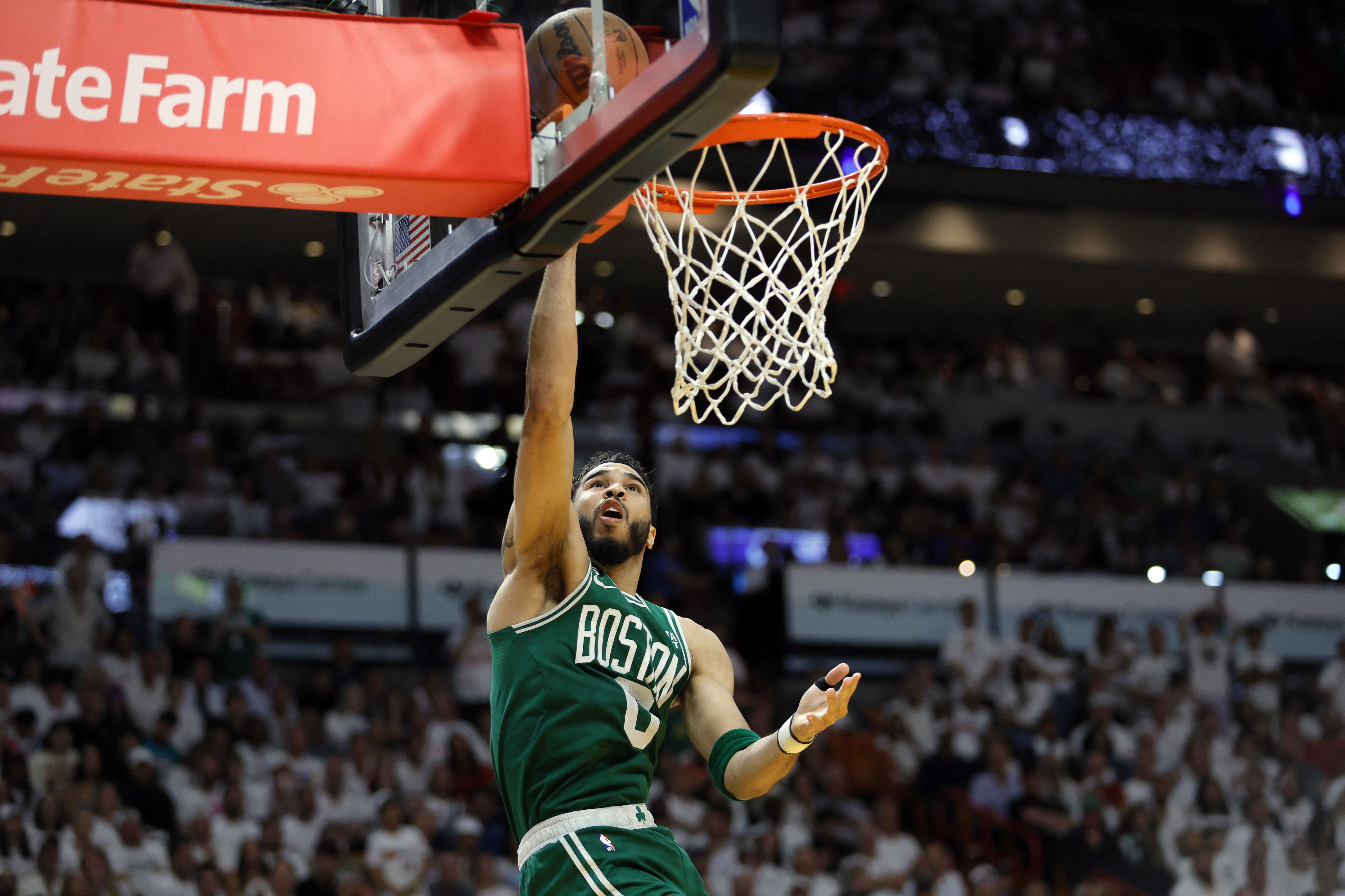 May 27, 2023; Miami, Florida, USA; Boston Celtics forward Jayson Tatum (0) shoots against the Miami Heat in the fourth quarter during game six of the Eastern Conference Finals for the 2023 NBA playoffs at Kaseya Center. Mandatory Credit: Sam Navarro-USA TODAY Sports