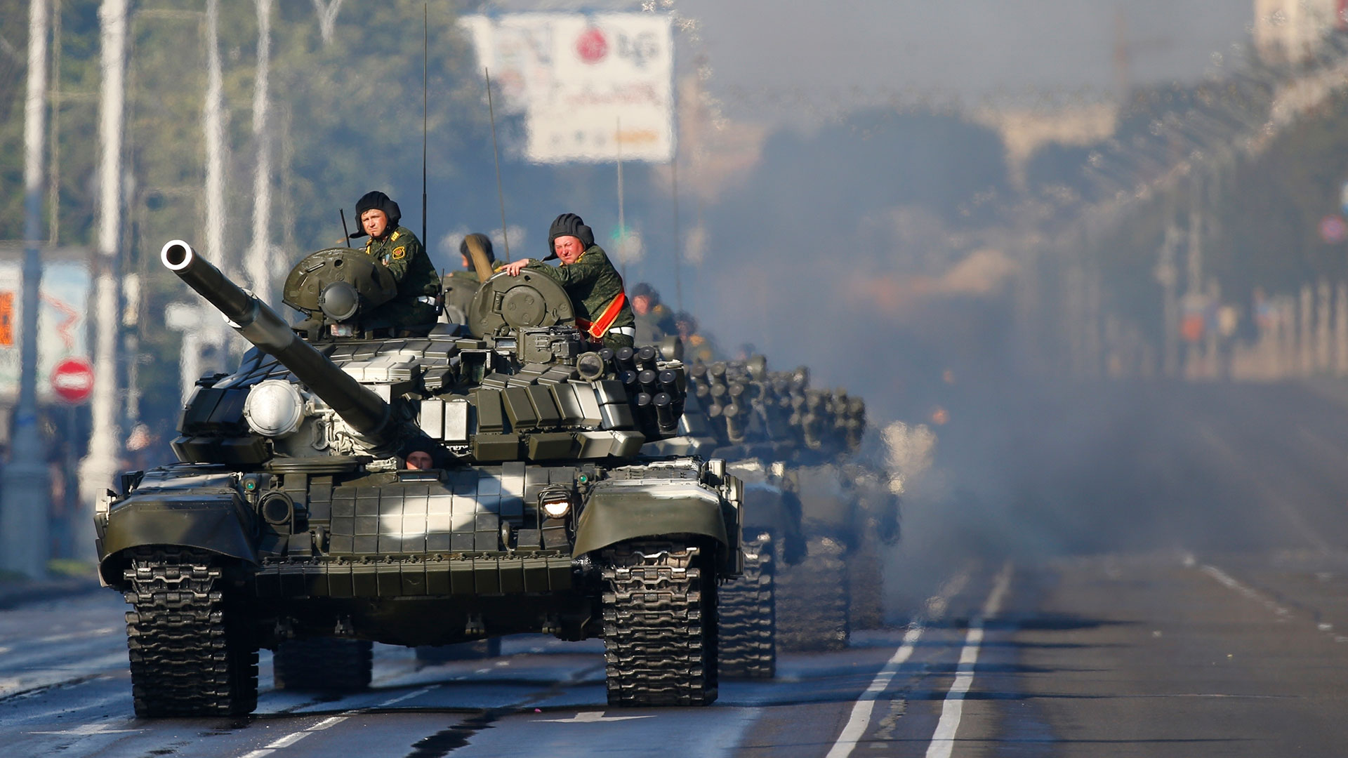 A haze rises around a column of Belarusian army tanks rehearsing a parade in Minsk (AP Photo, File)