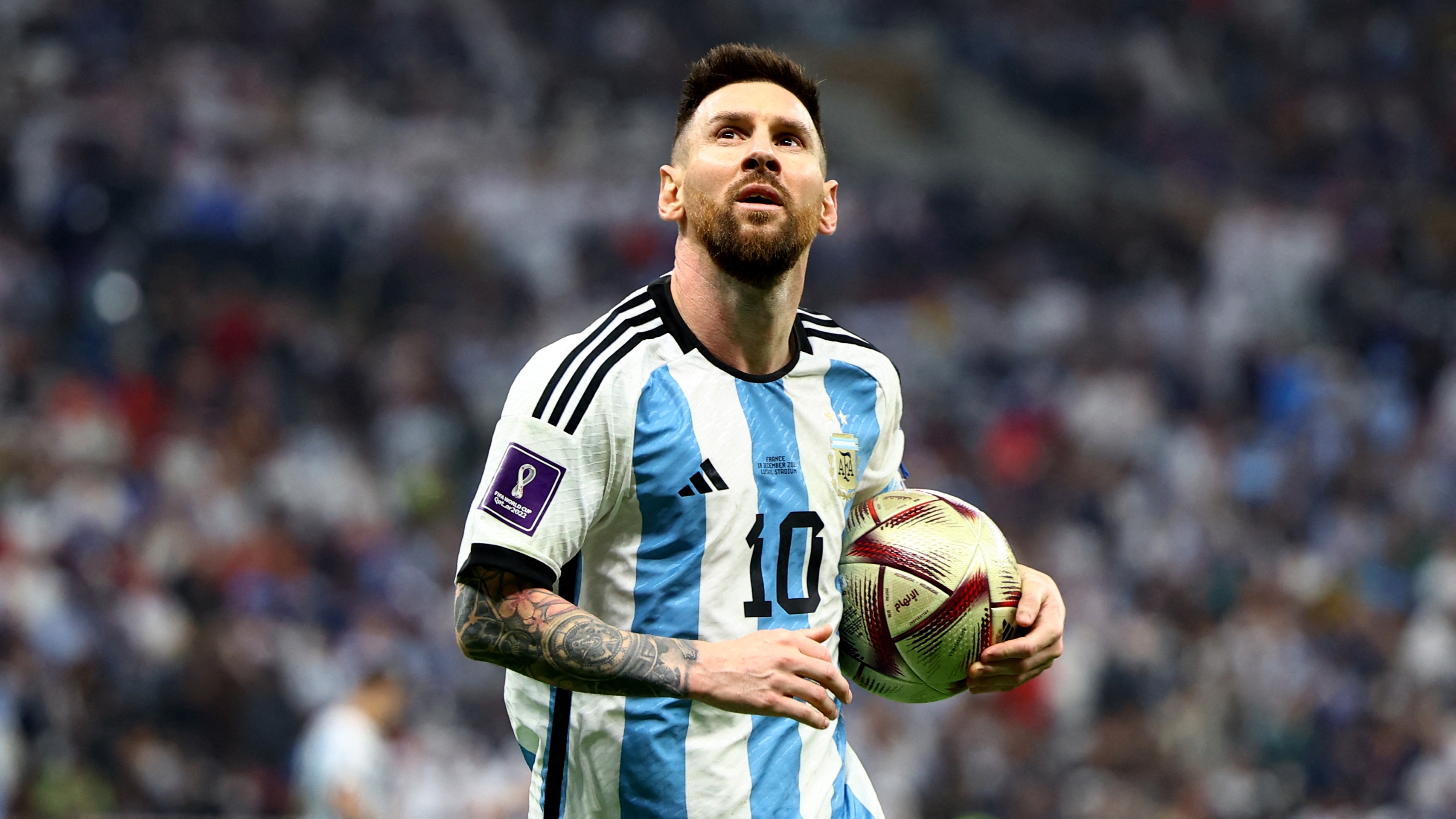 Soccer Football - FIFA World Cup Qatar 2022 - Final - Argentina v France - Lusail Stadium, Lusail, Qatar - December 18, 2022 Argentina's Lionel Messi looks on REUTERS/Kai Pfaffenbach