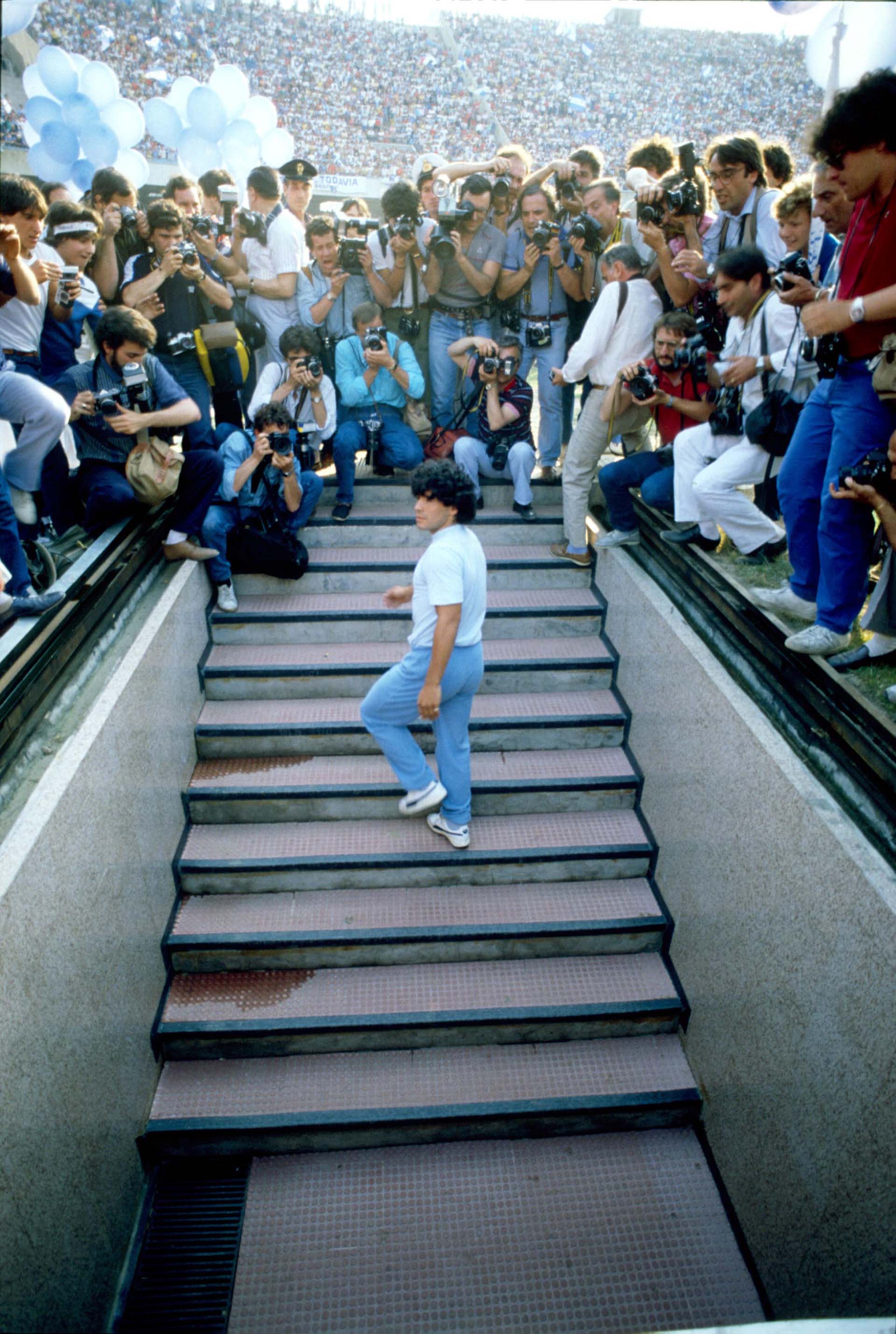 Mandatory Credit: Photo by Vittorio La Verde/Agf/Shutterstock (8600031a)
Maradona arriving at San Paolo Stadium after signing for Napoli
Maradona at San Paolo stadium, Napoli, Italy - 05 Jul 1984