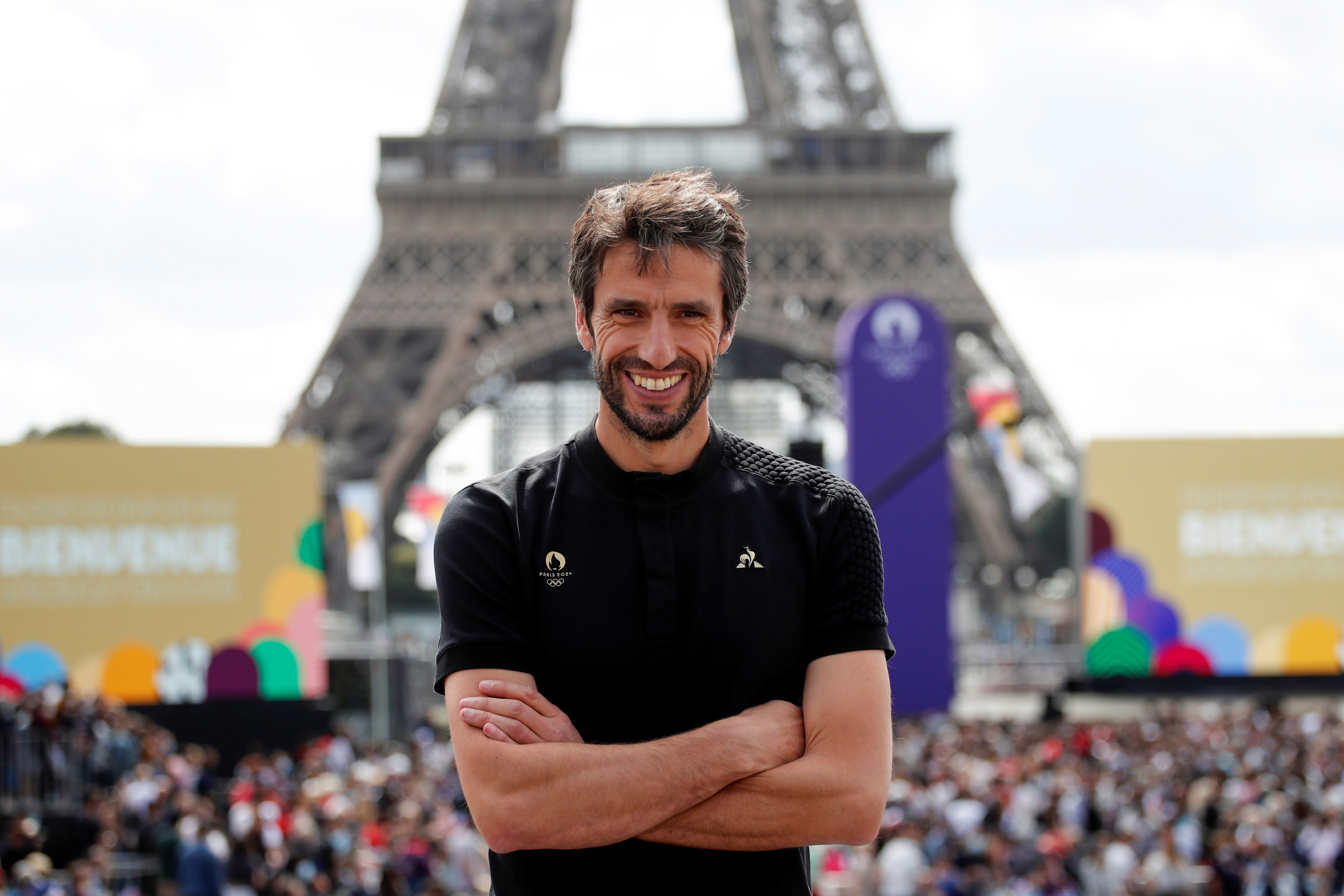 Paris 2024 Olympics Organising Committee President Tony Estanguet poses in front of the Eiffel Tower as people gather at Paris' Olympics fan zone to watch the closing ceremony of the Tokyo games, at Trocadero Gardens in Paris, France, August 8, 2021. REUTERS/Benoit Tessier